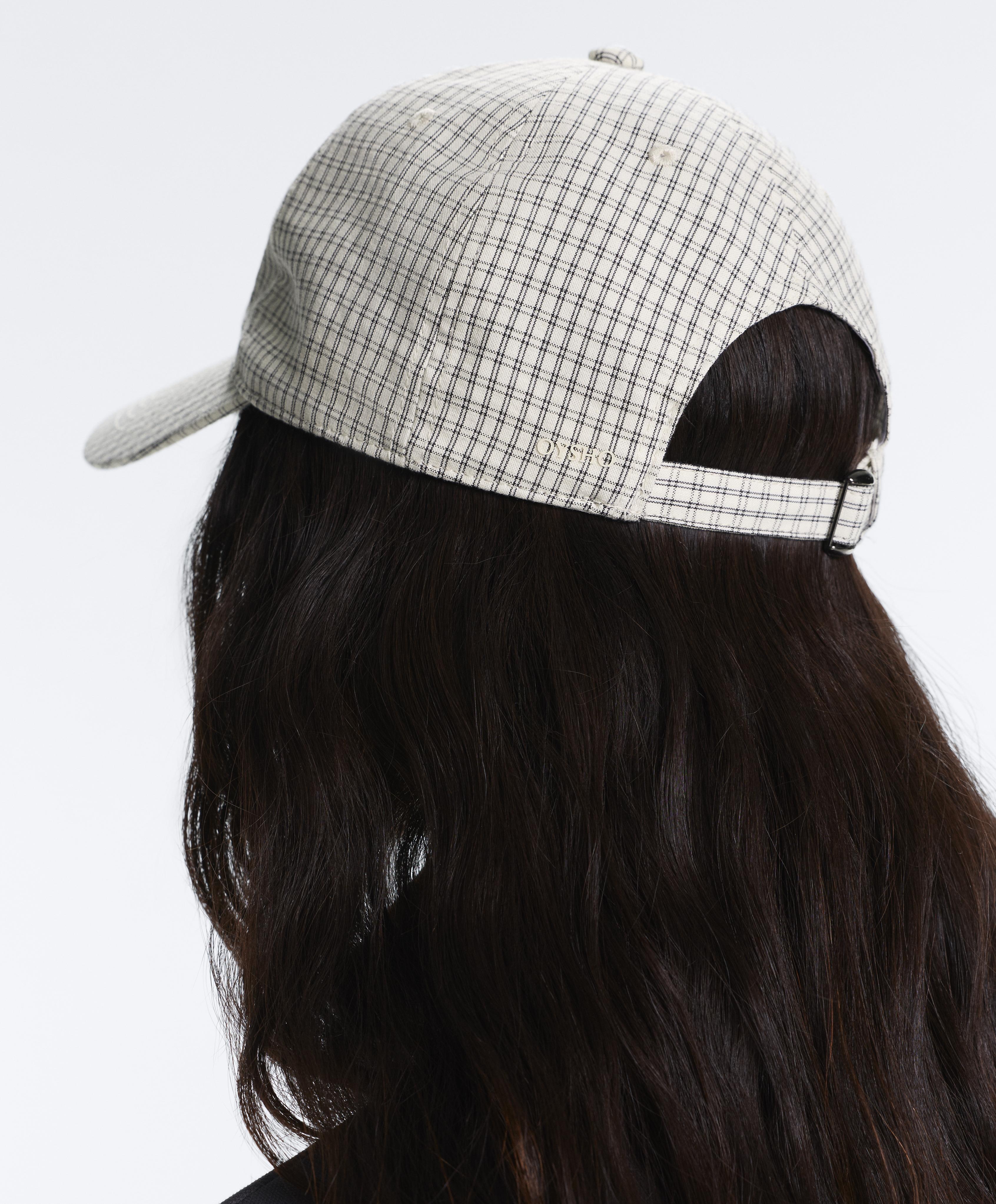 Check print cap — ECRU