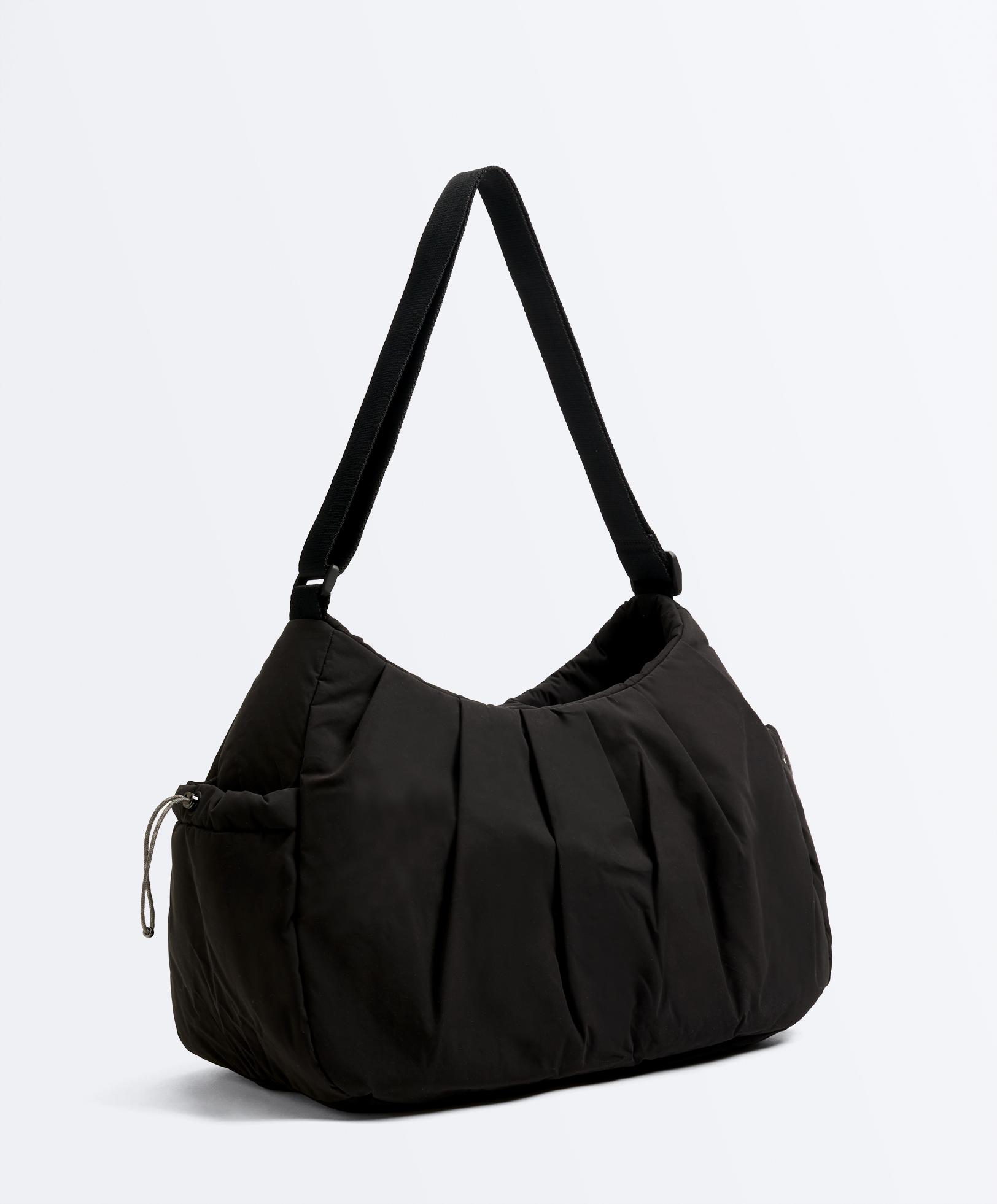 حقيبة تسوق بجيوب جانبية