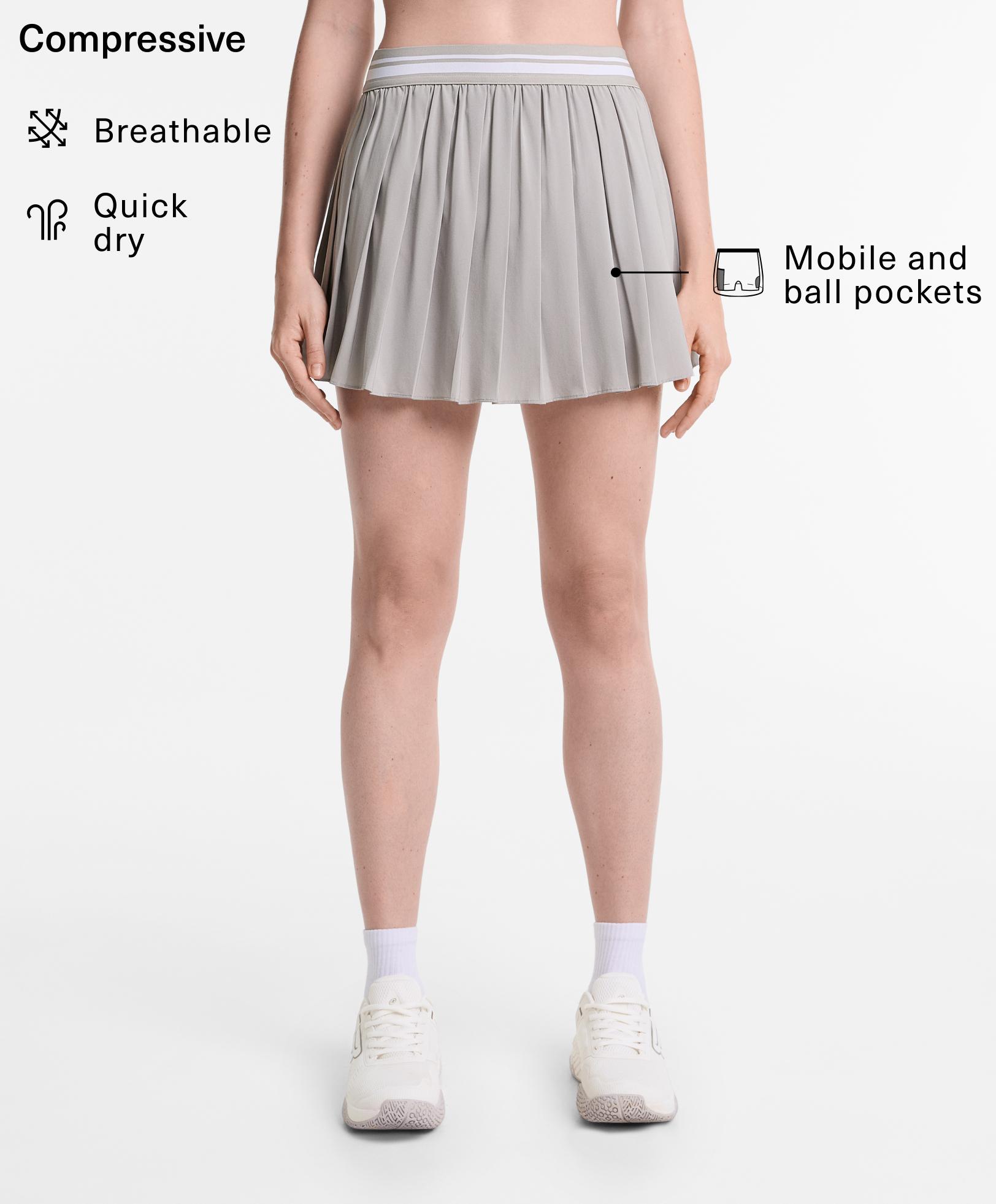 Pleated compressive skirt