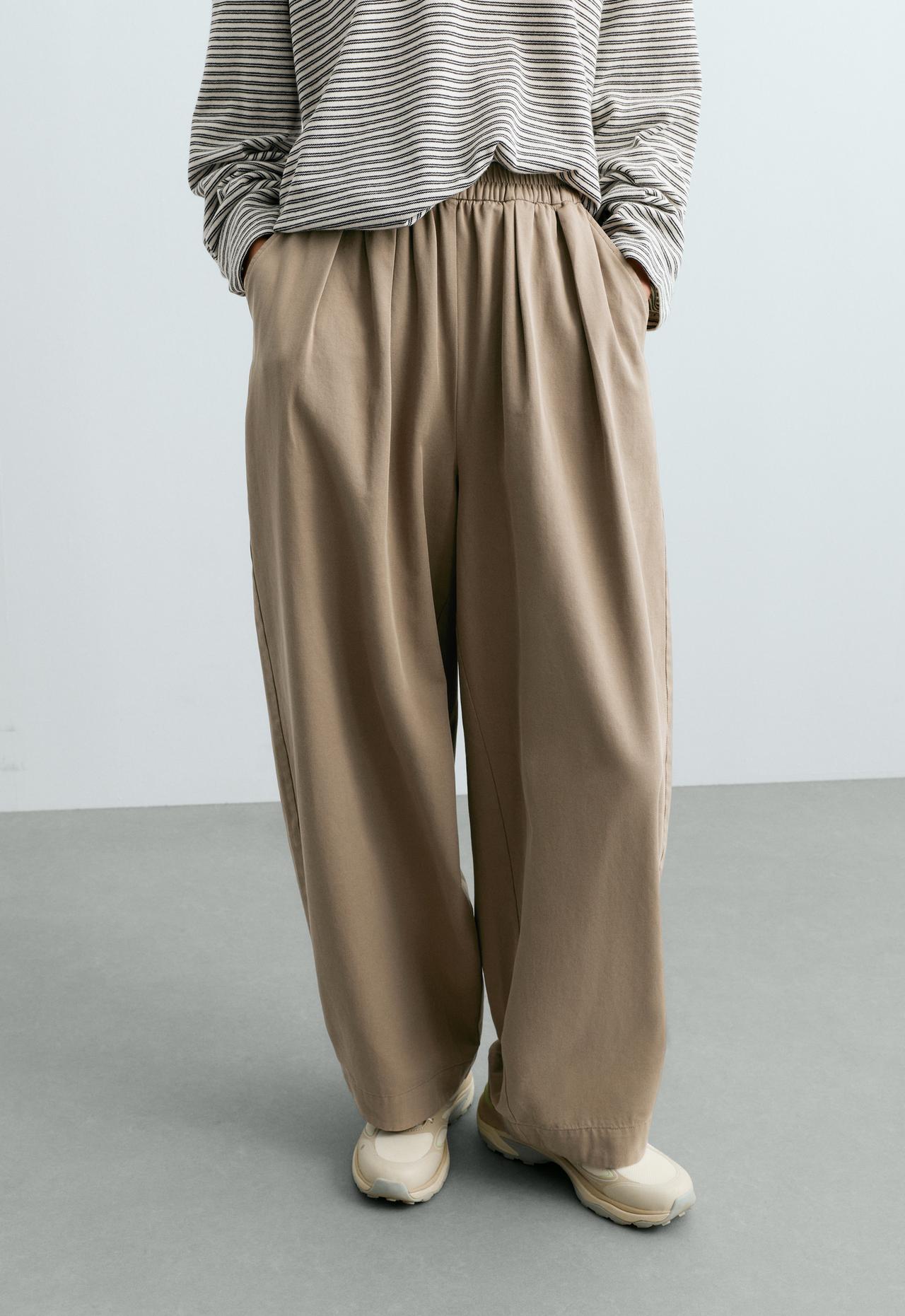 Tapered pleat cotton-blend trousers — WASHED KHAKI