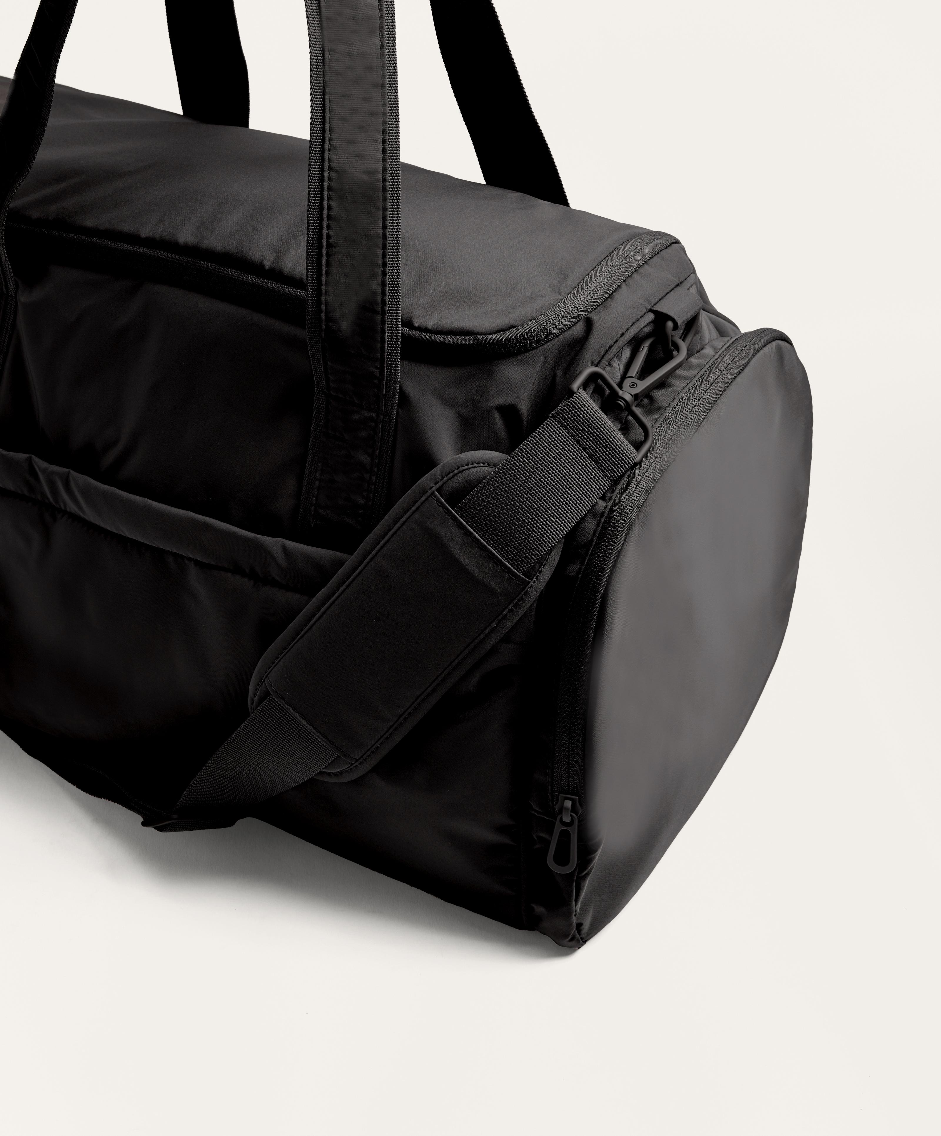 Technical bag with side pockets