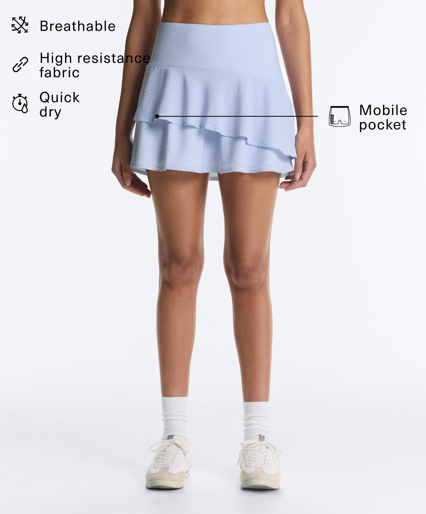 Short high rise skirt with striped ruffles Short high rise skirt with striped ruffles