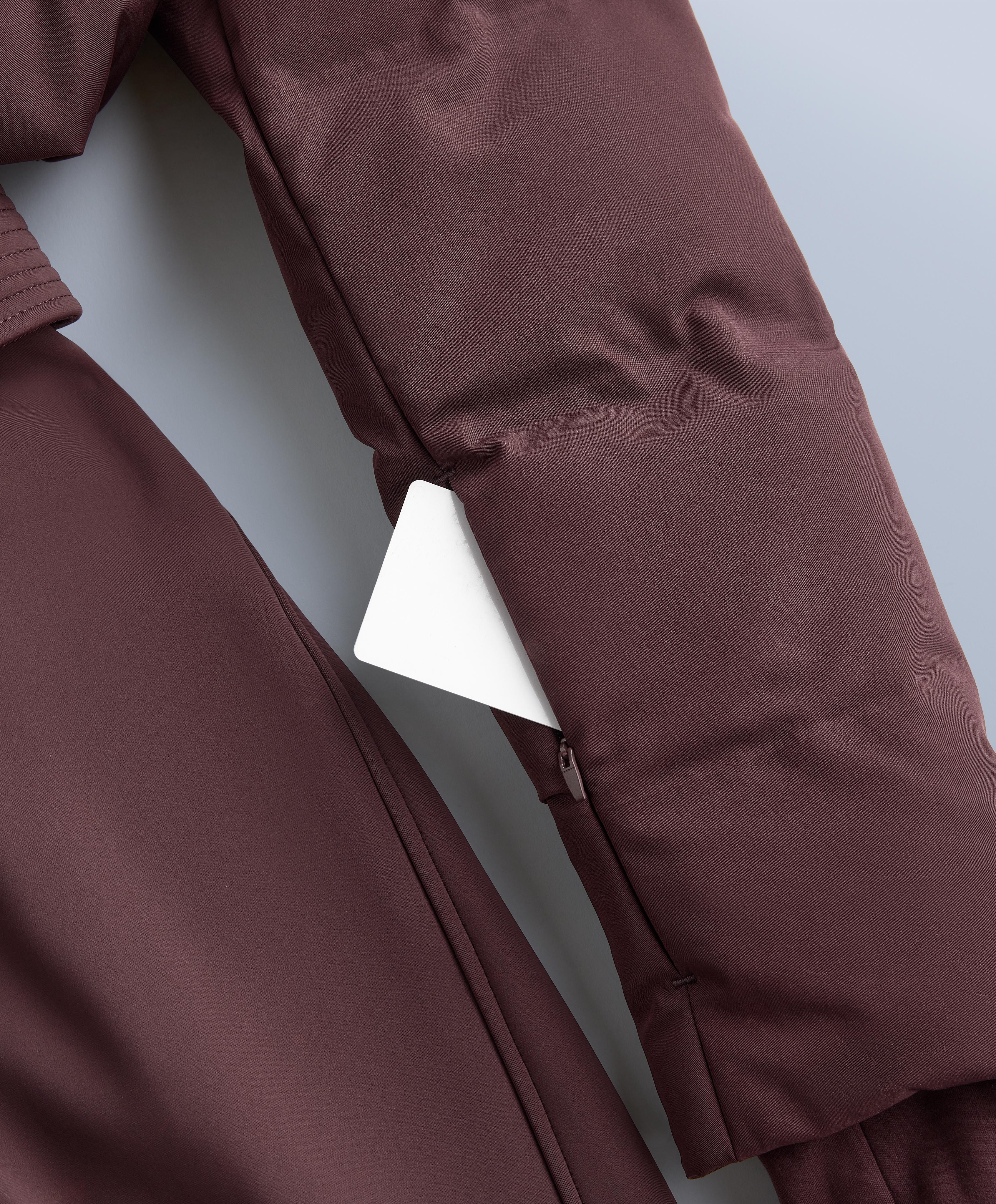 MINARDI PIUME SKI water-resistant padded jumpsuit with 80% down and 20% feather filling — DARK WINE RED