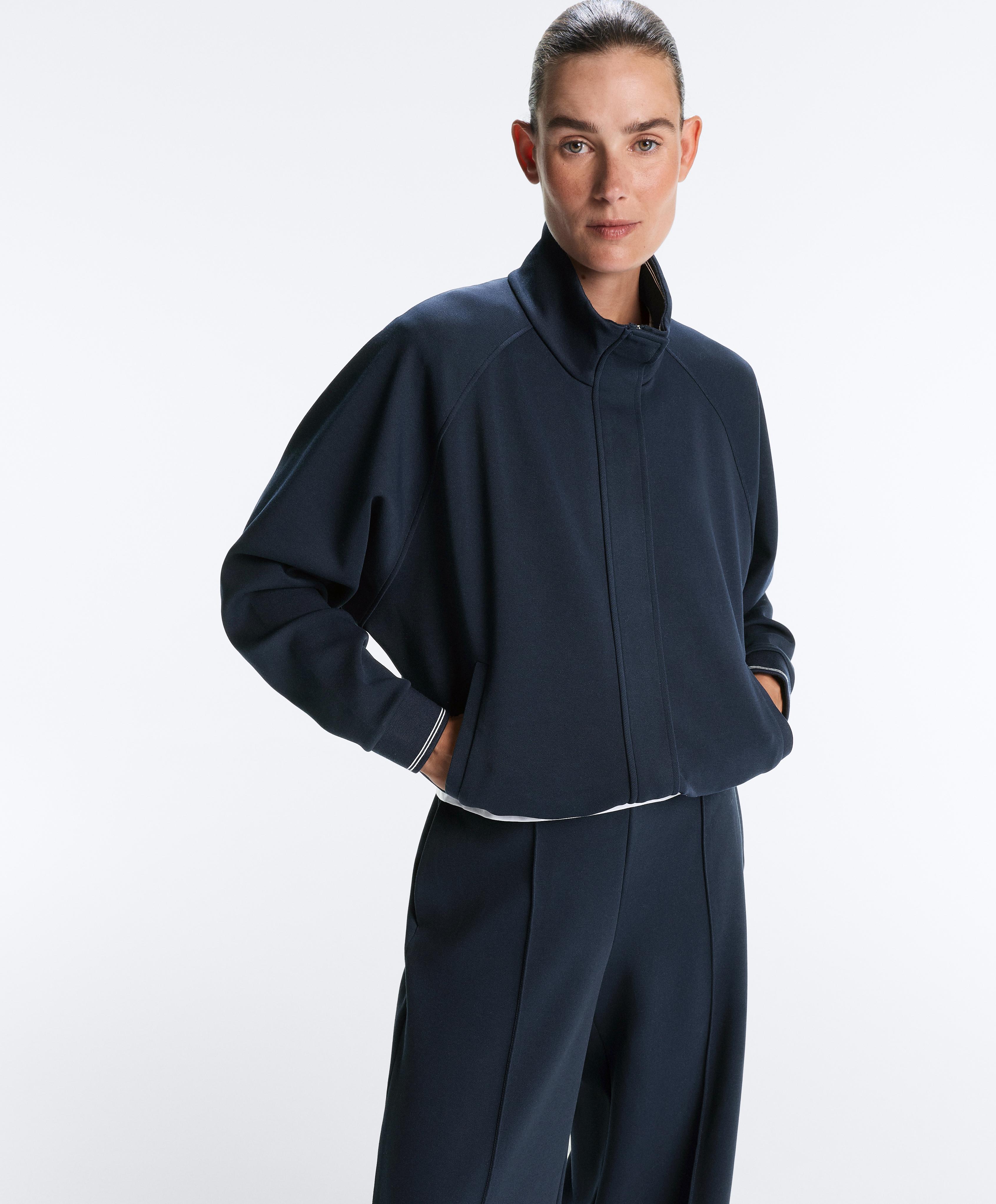 Casaco piqué com algodão e piping contraste Casaco piqué com algodão e piping contraste