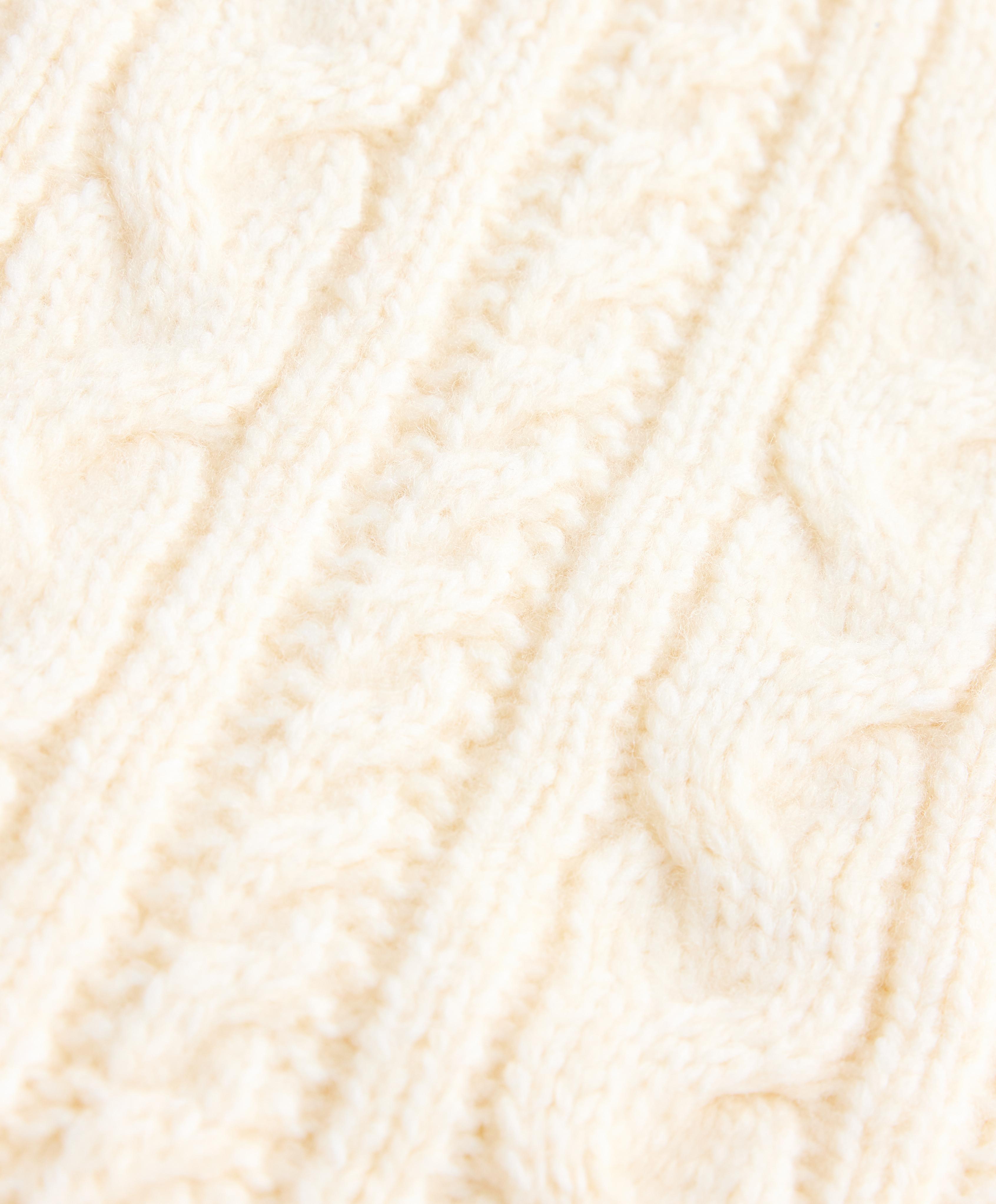 High neck cable knit jumper