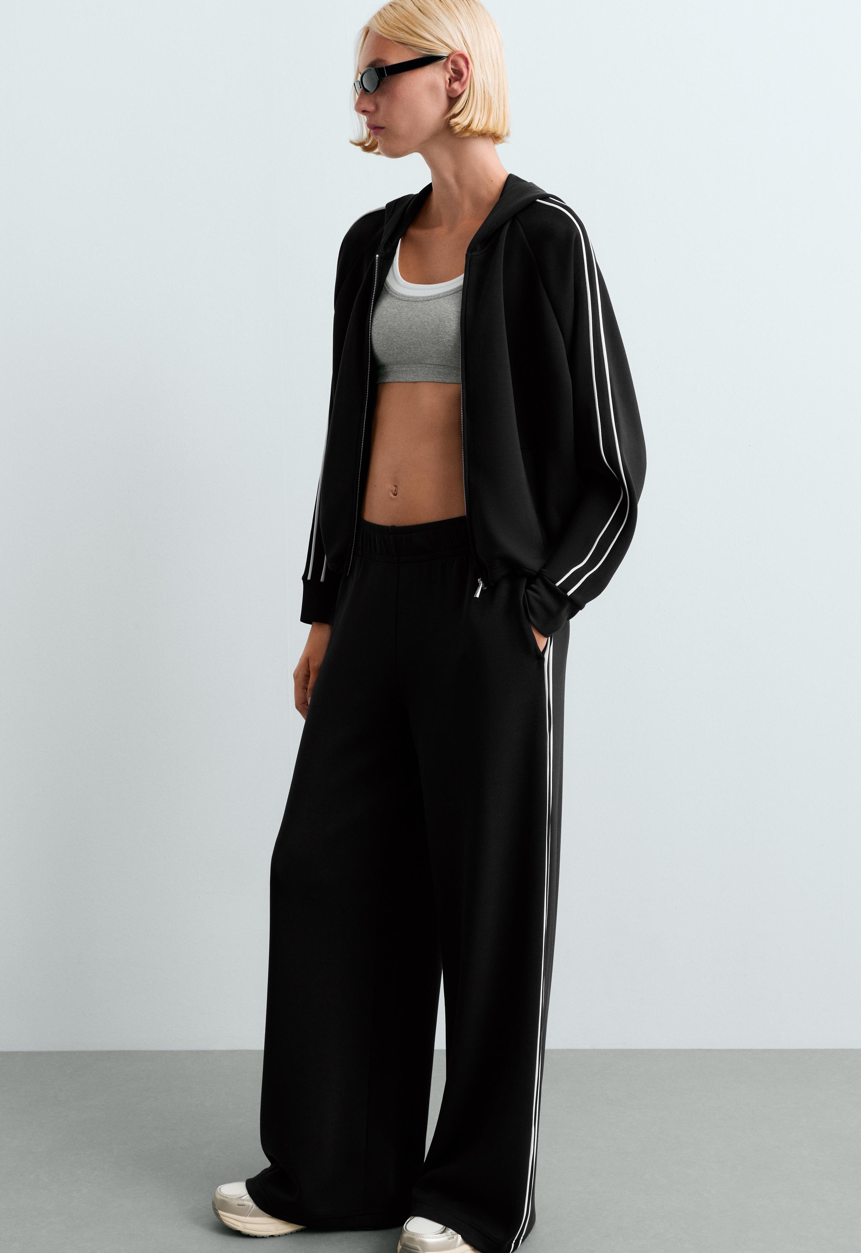 Pantalon large en modal avec piping Pantalon large en modal avec piping