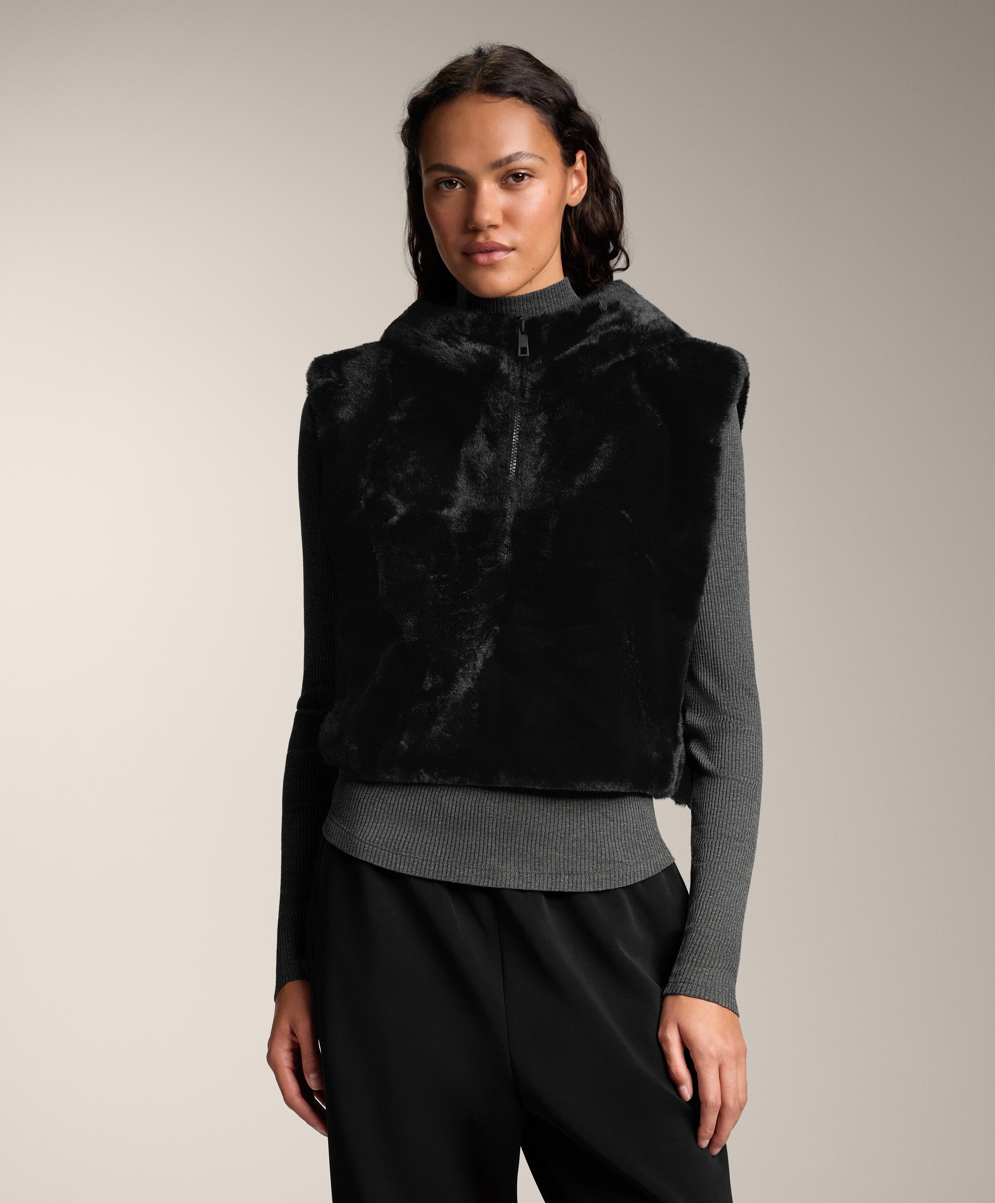 Faux fur gilet with hood Faux fur gilet with hood