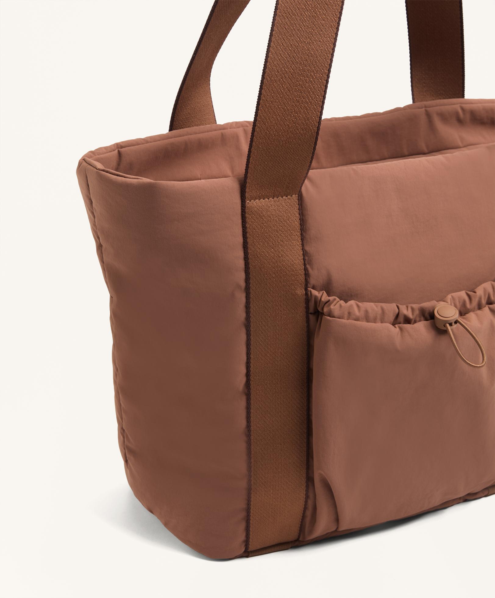 Mala shopper com bolso à frente