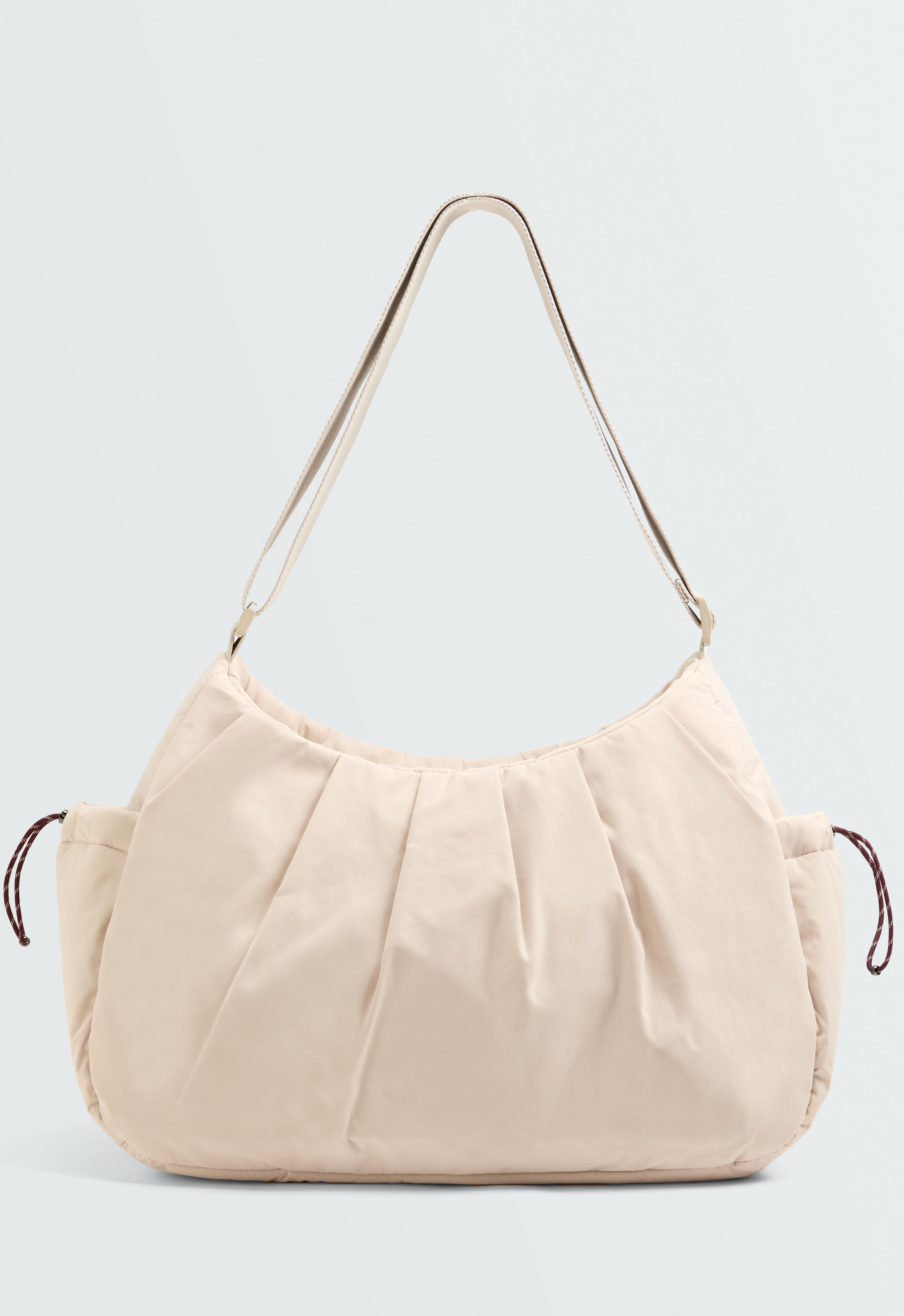 Bolso shopper con bolsillos laterales Bolso shopper con bolsillos laterales
