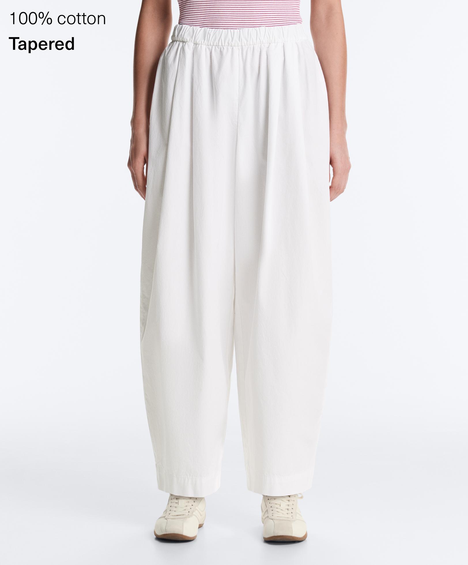 Pantalón tapered pliegues 100% algodón