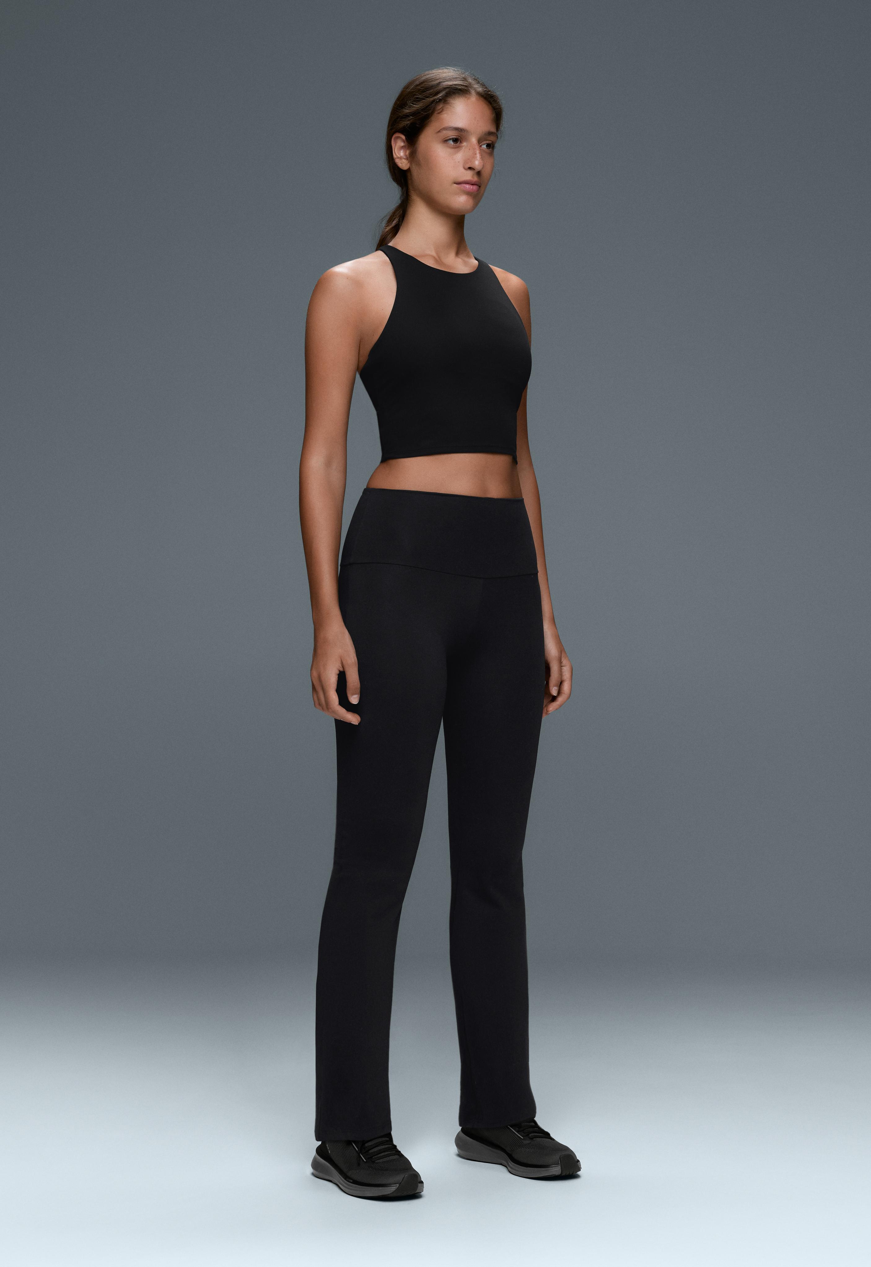 High-rise Comfortlux flare trousers — BLACK
