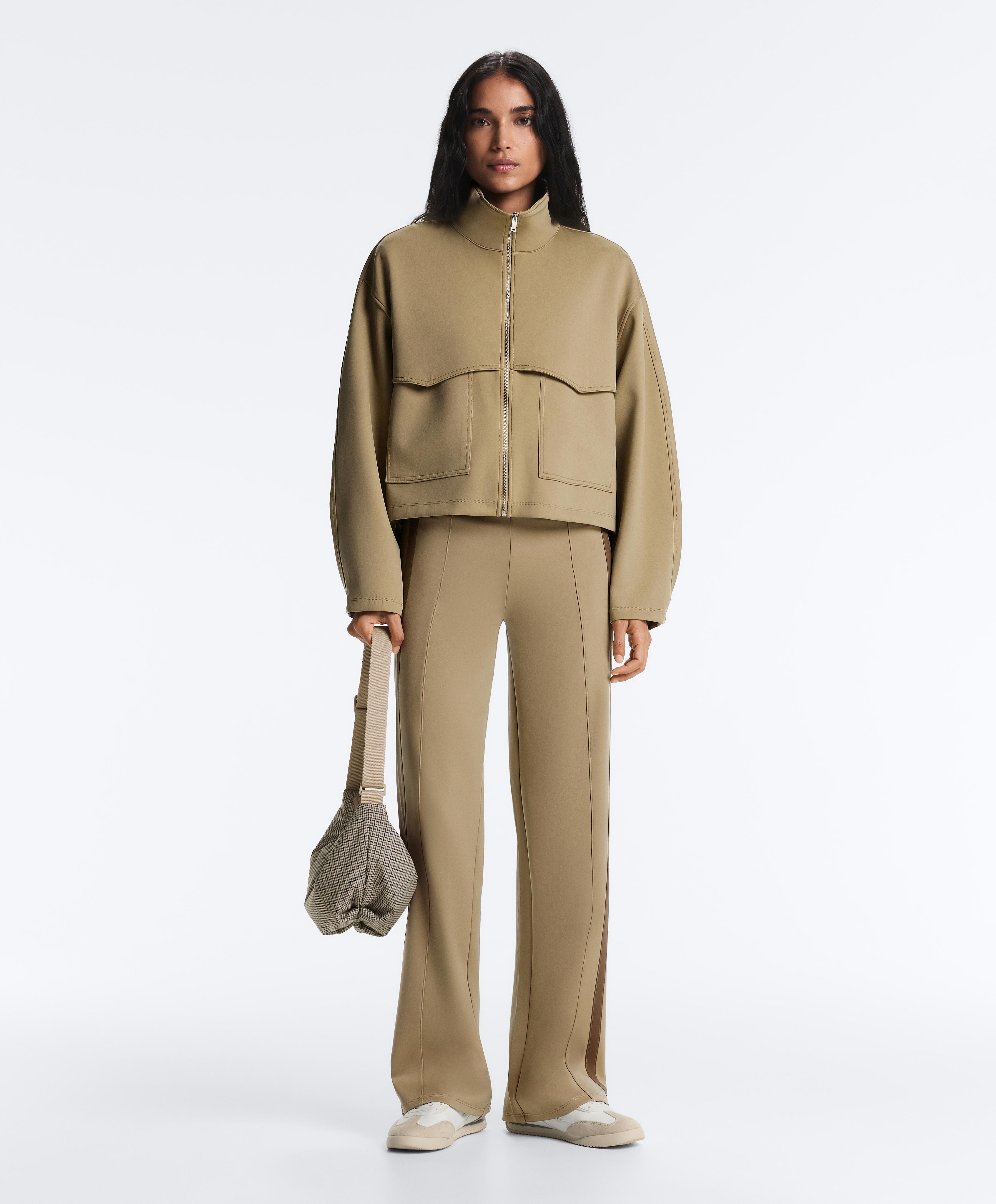 High rise neoprene-effect straight-leg trousers with piping High rise neoprene-effect straight-leg trousers with piping