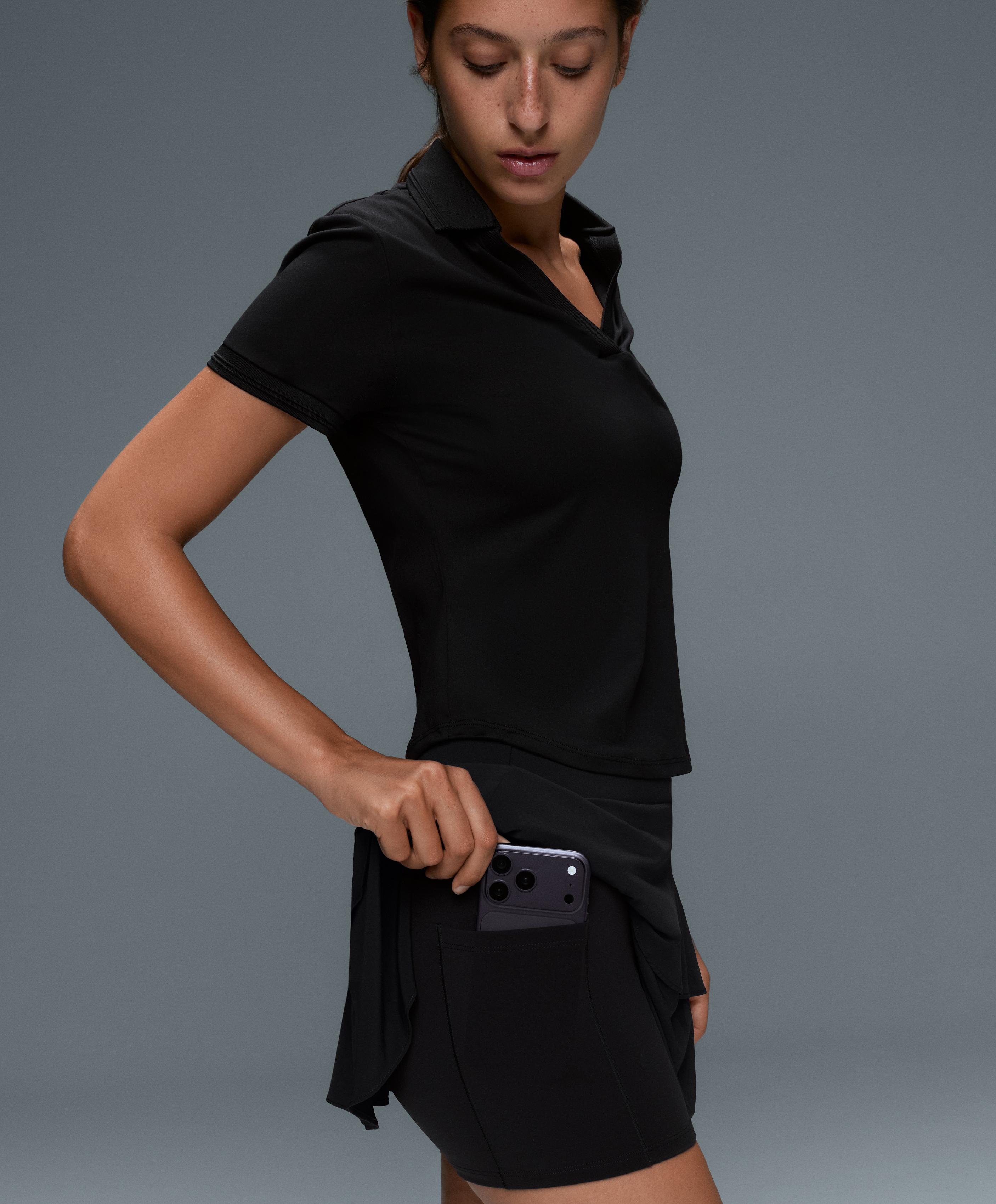 High-rise Compressive frill short skirt — BLACK