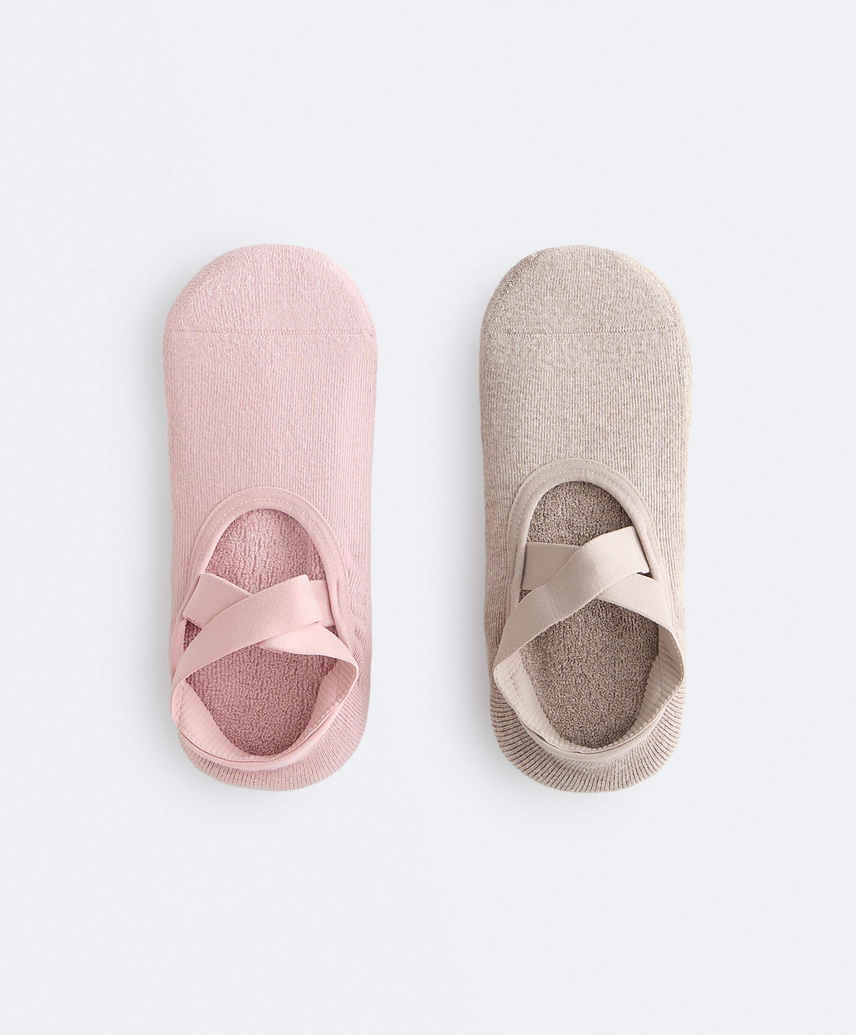 2 pairs of cotton blend yoga and Pilates socks with crossover straps