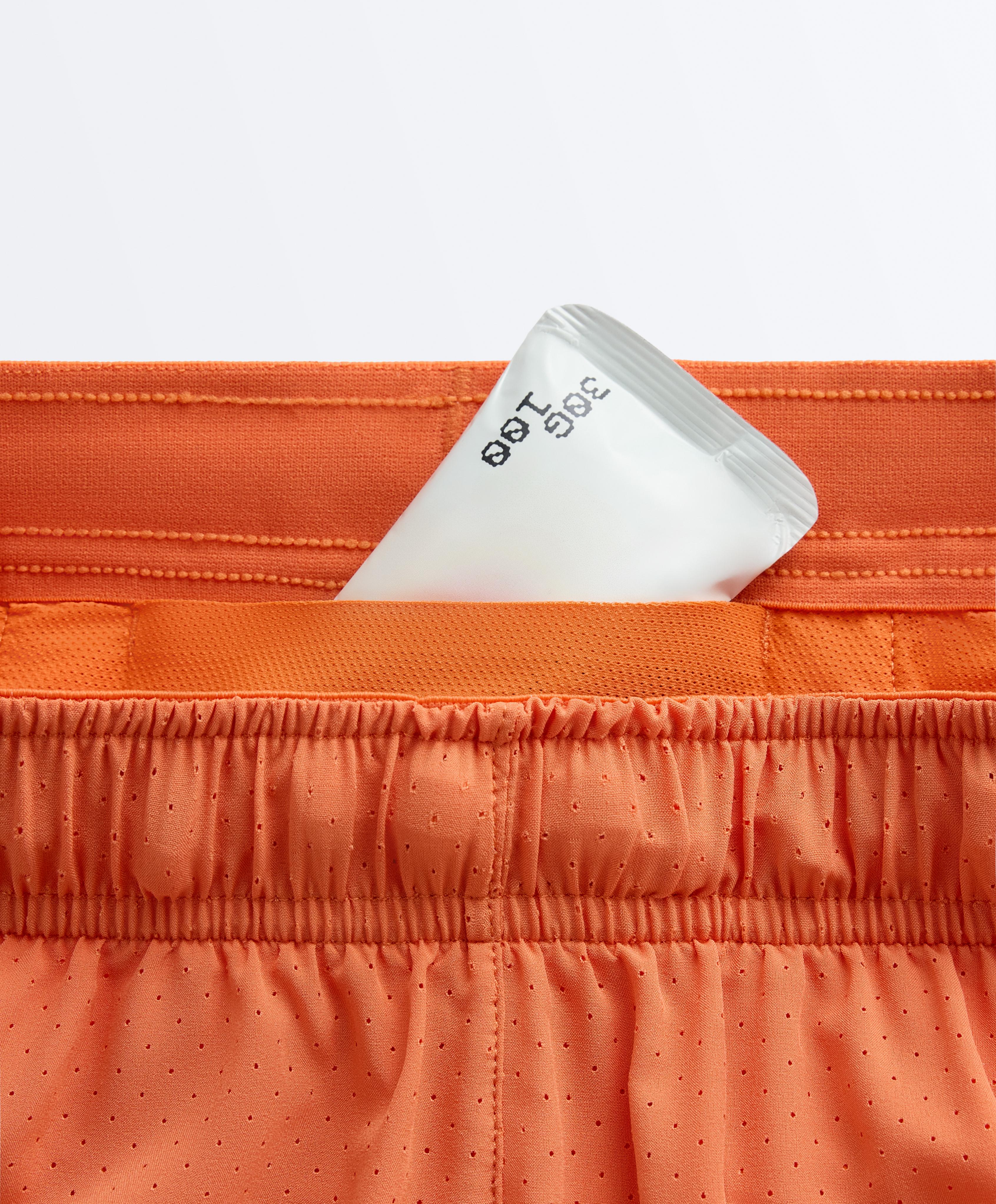 Mid-rise 7cm technical shorts — WASHED ORANGE