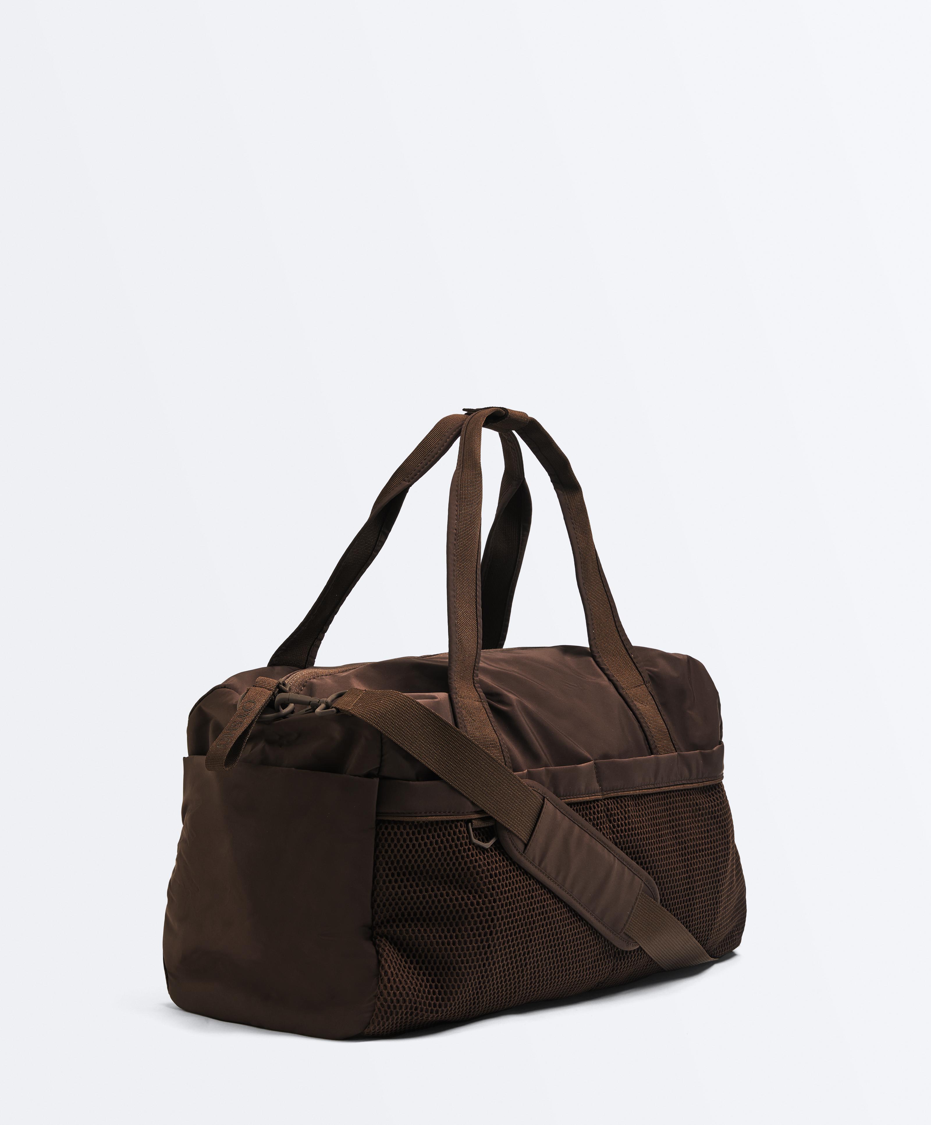 Double compartment sports bag