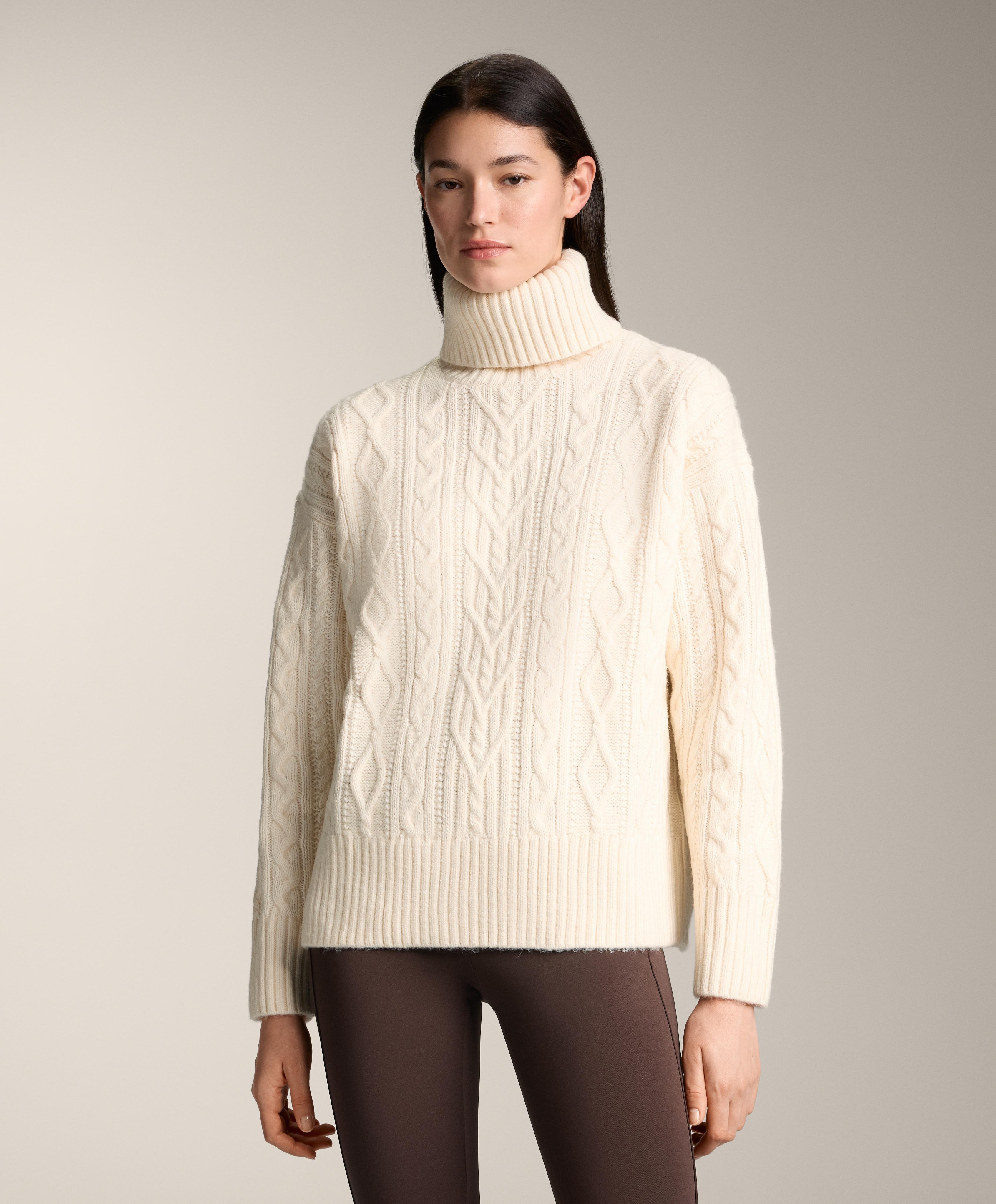 High neck cable knit jumper