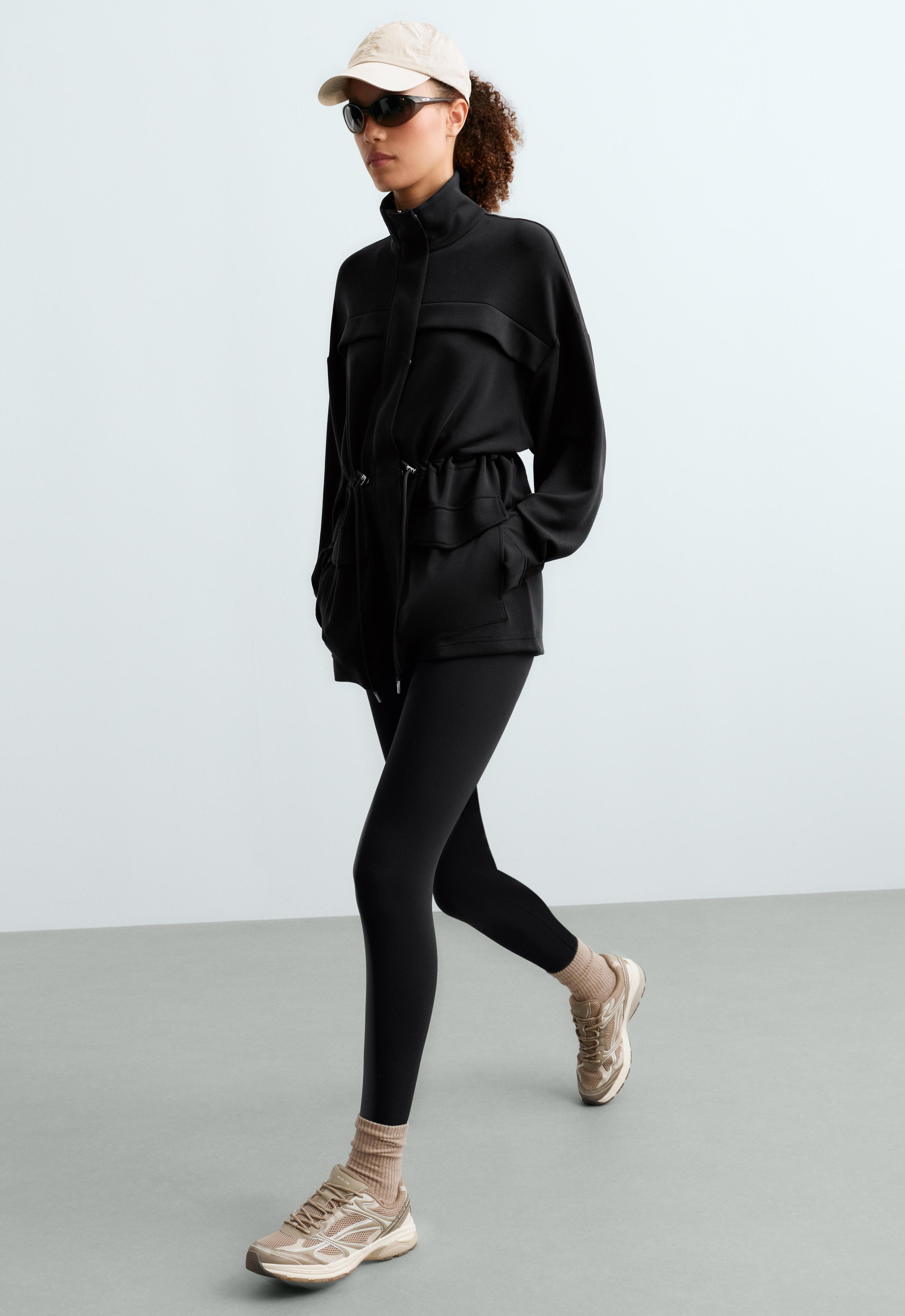 Long soft-touch modal jacket with pockets — BLACK