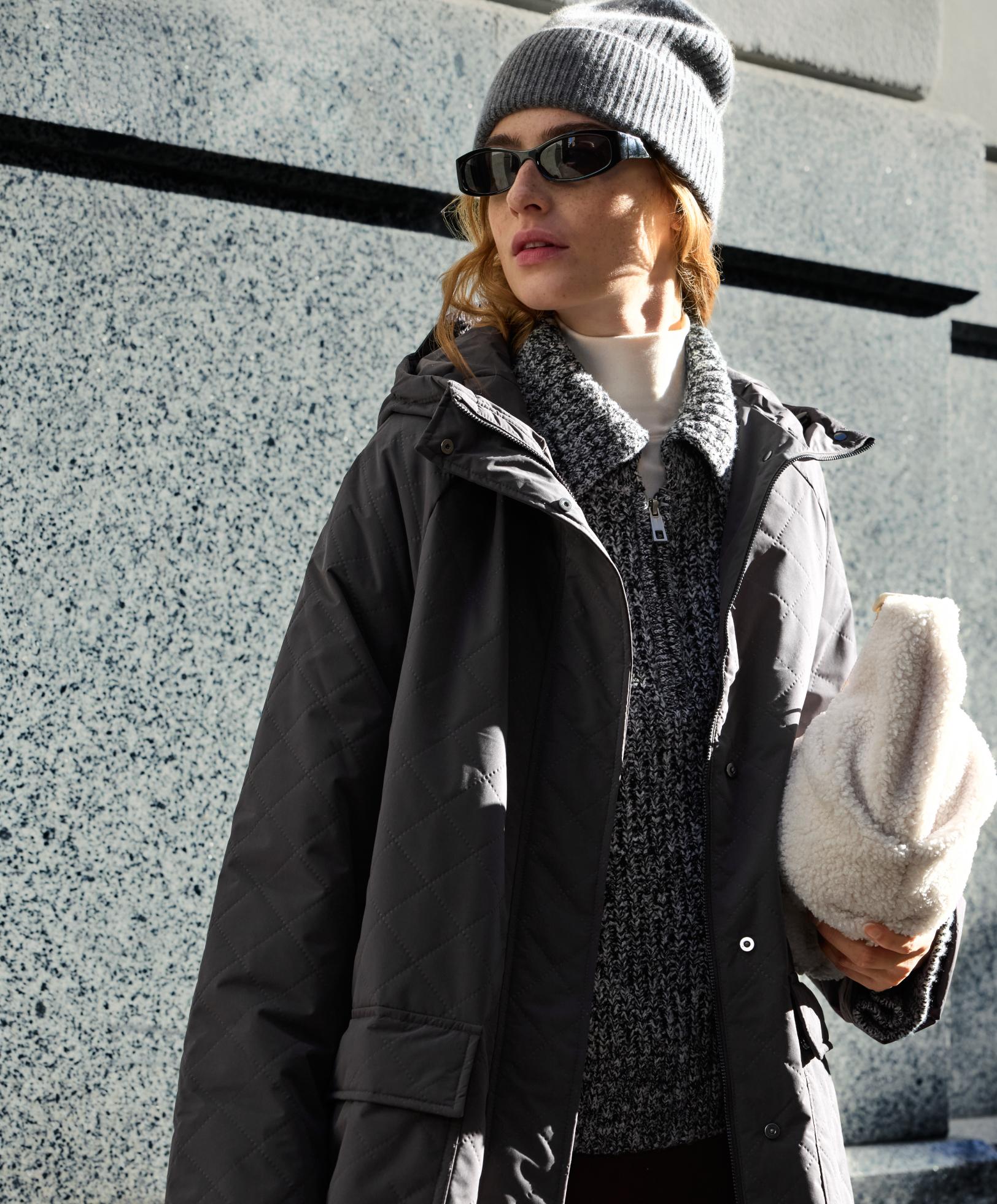 Gebreide trui met kabelpatroon en halfrits