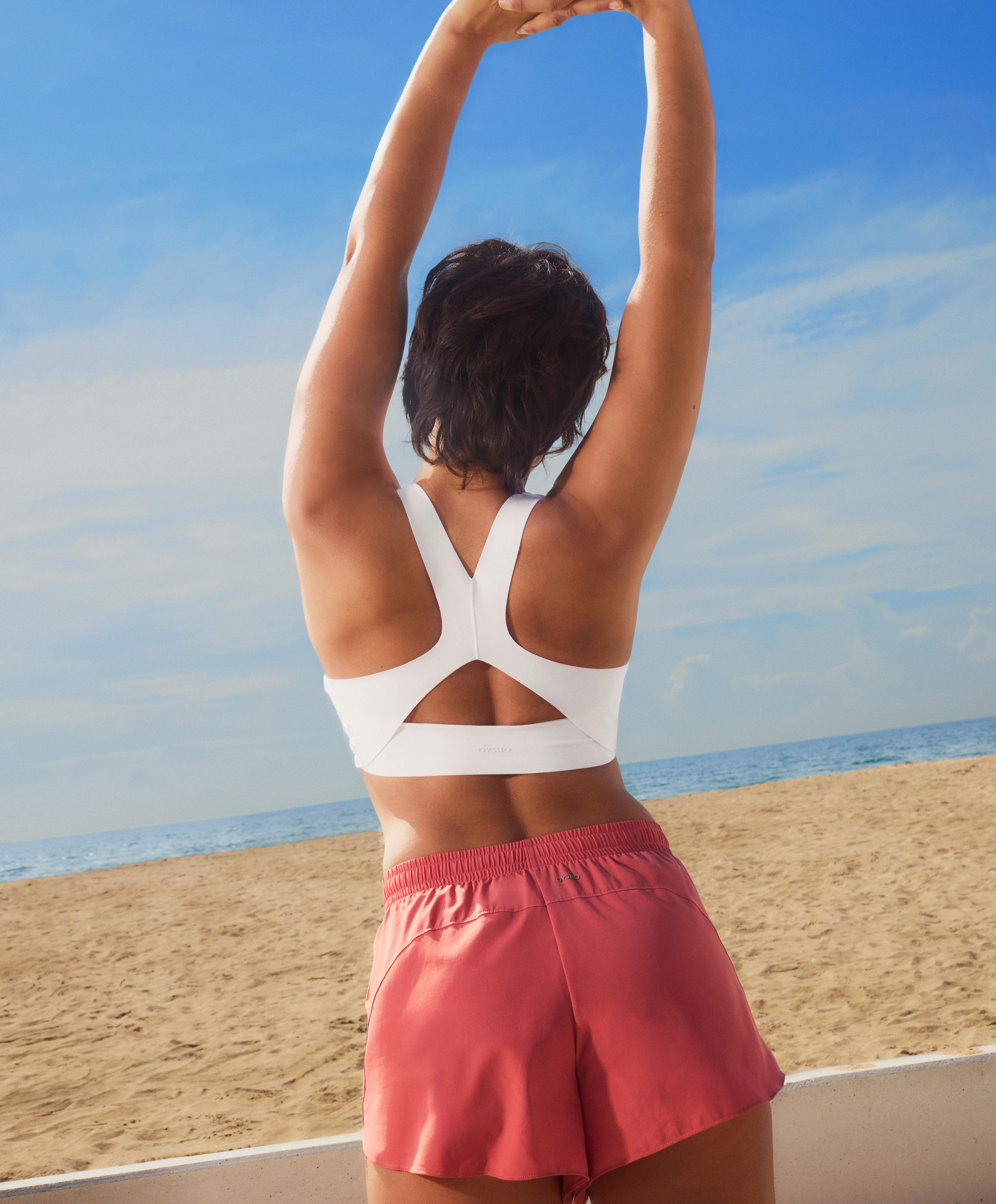 Medium-support compressive bra with cups