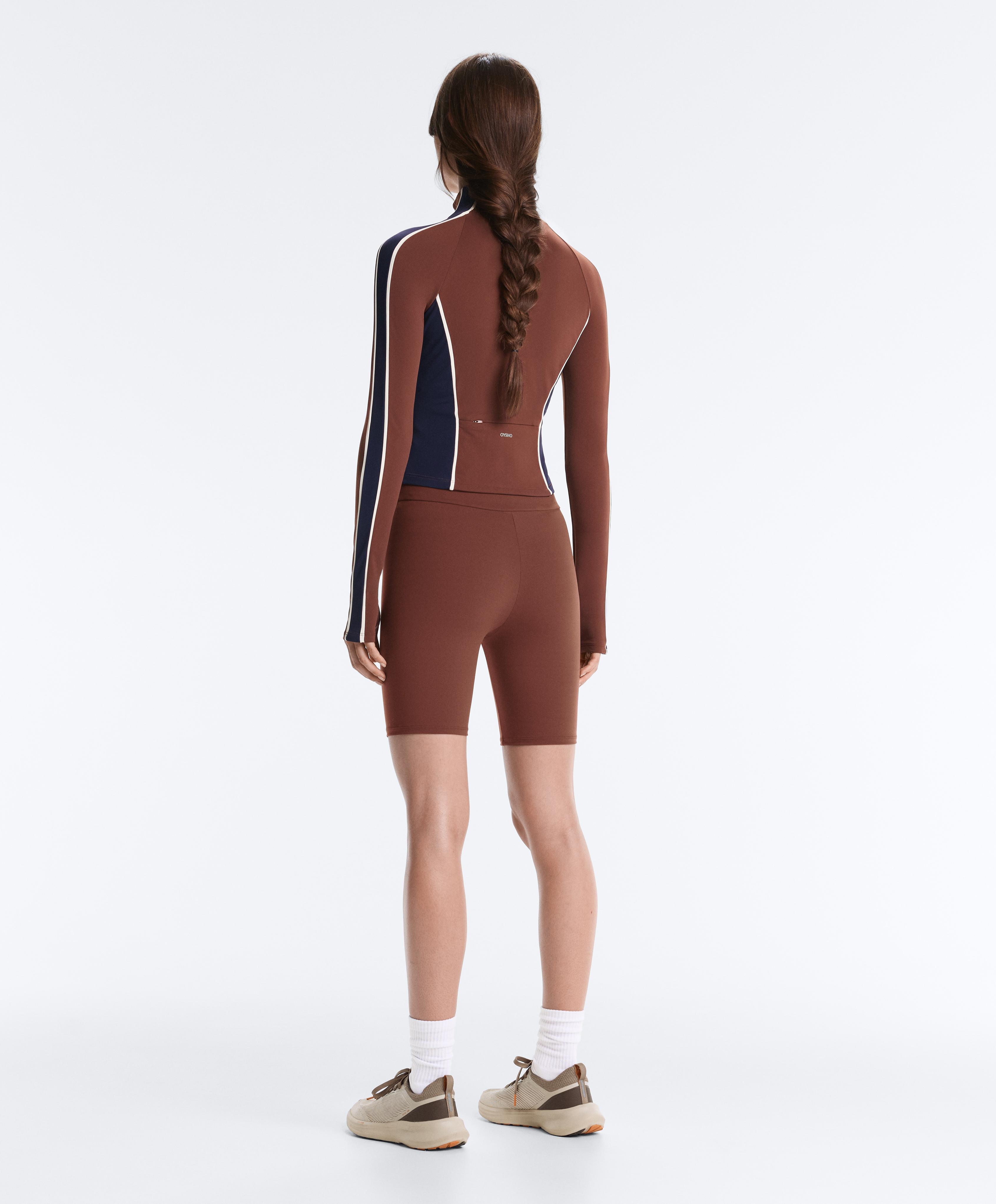 Light warm colour-block technical jacket — TERRACOTTA