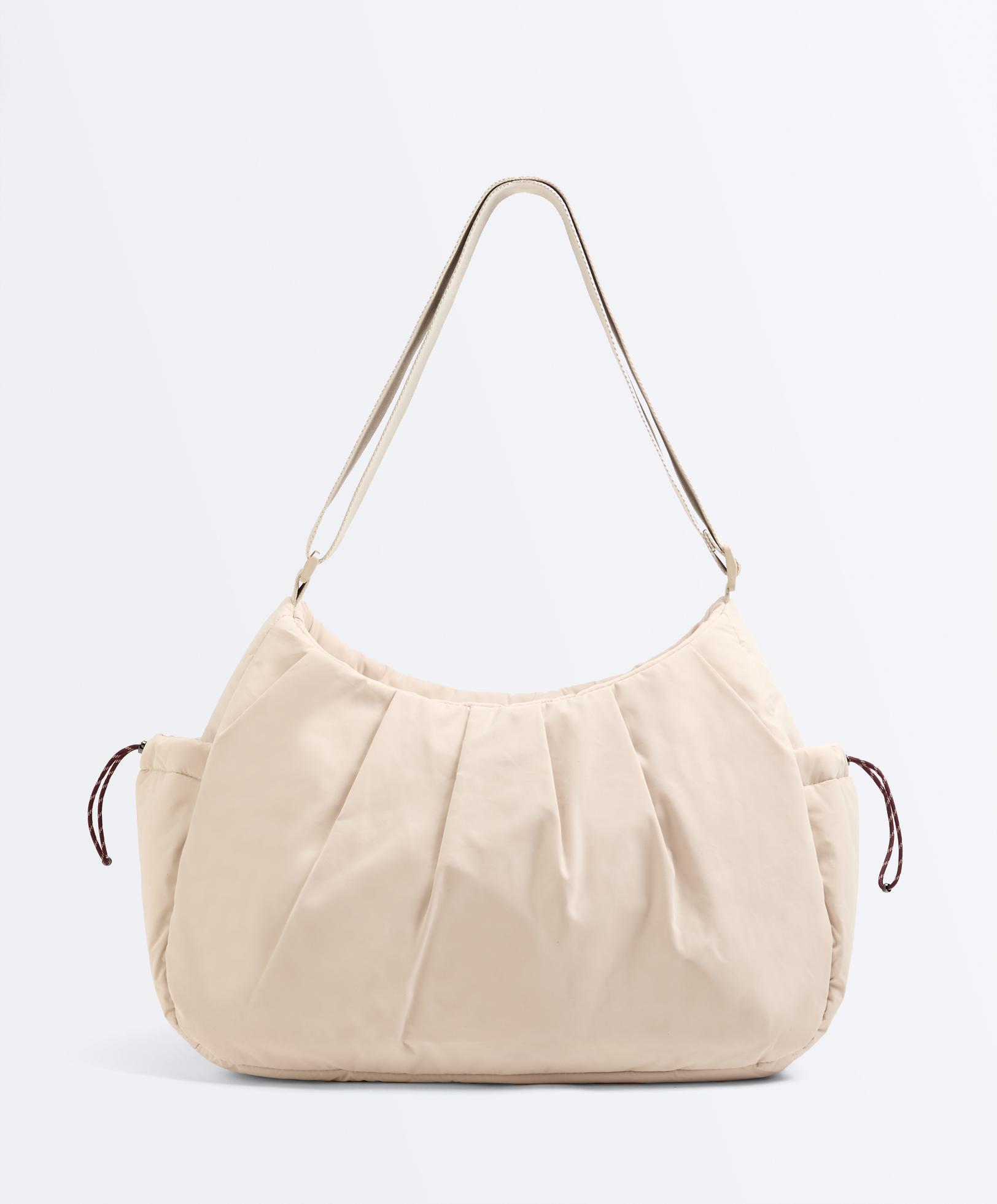 حقيبة تسوق بجيوب جانبية