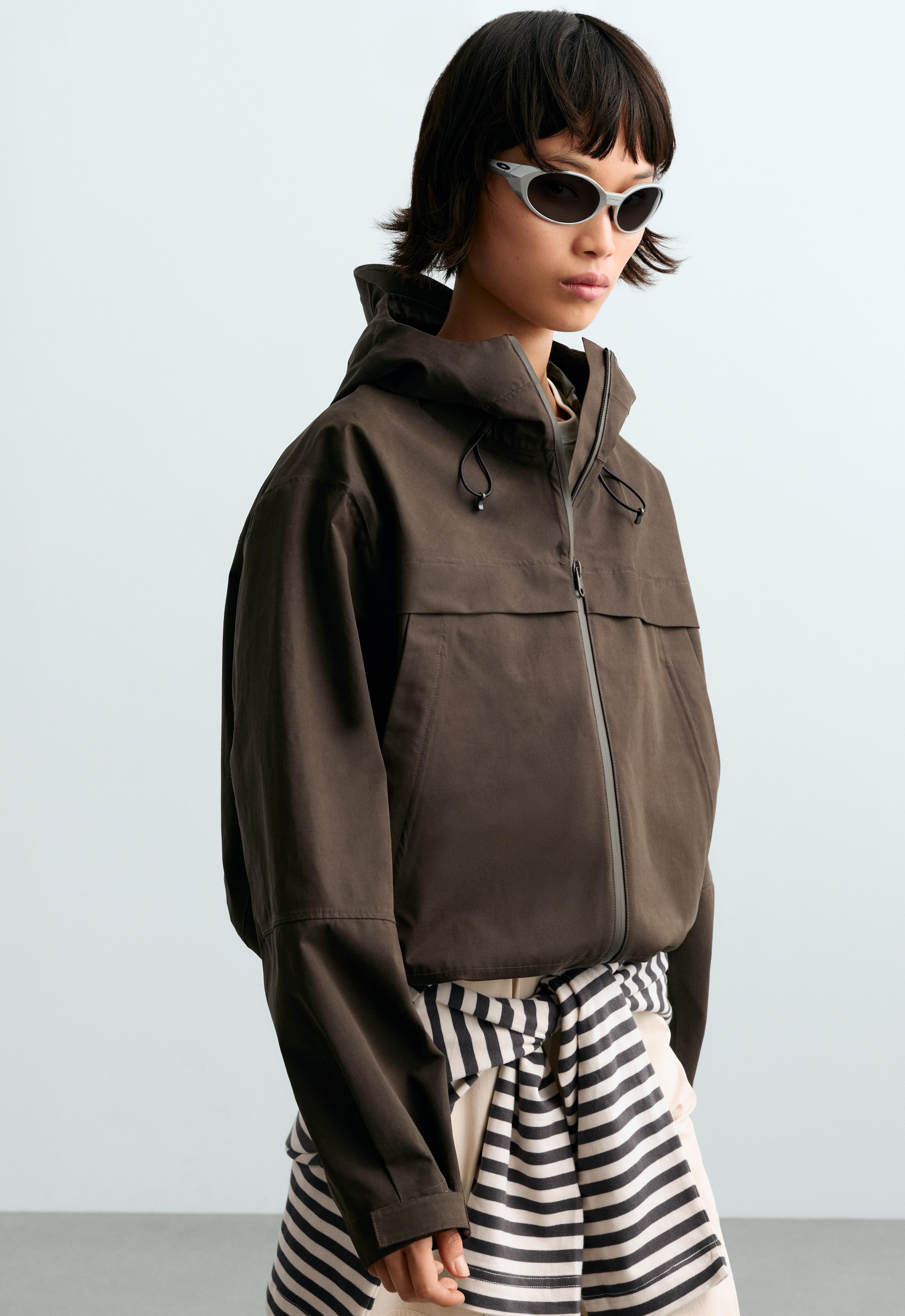 Kurze technische 10k wasserdichte Canvas-Jacke