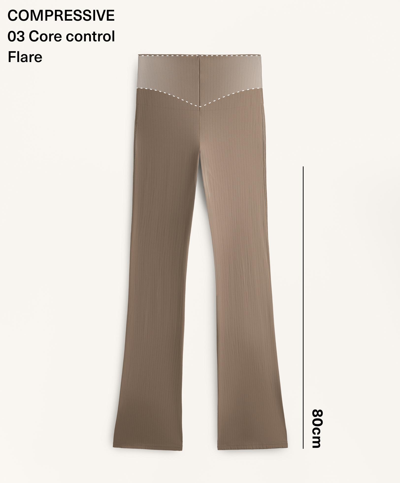 High-rise Compressive core control block stripe flare trousers