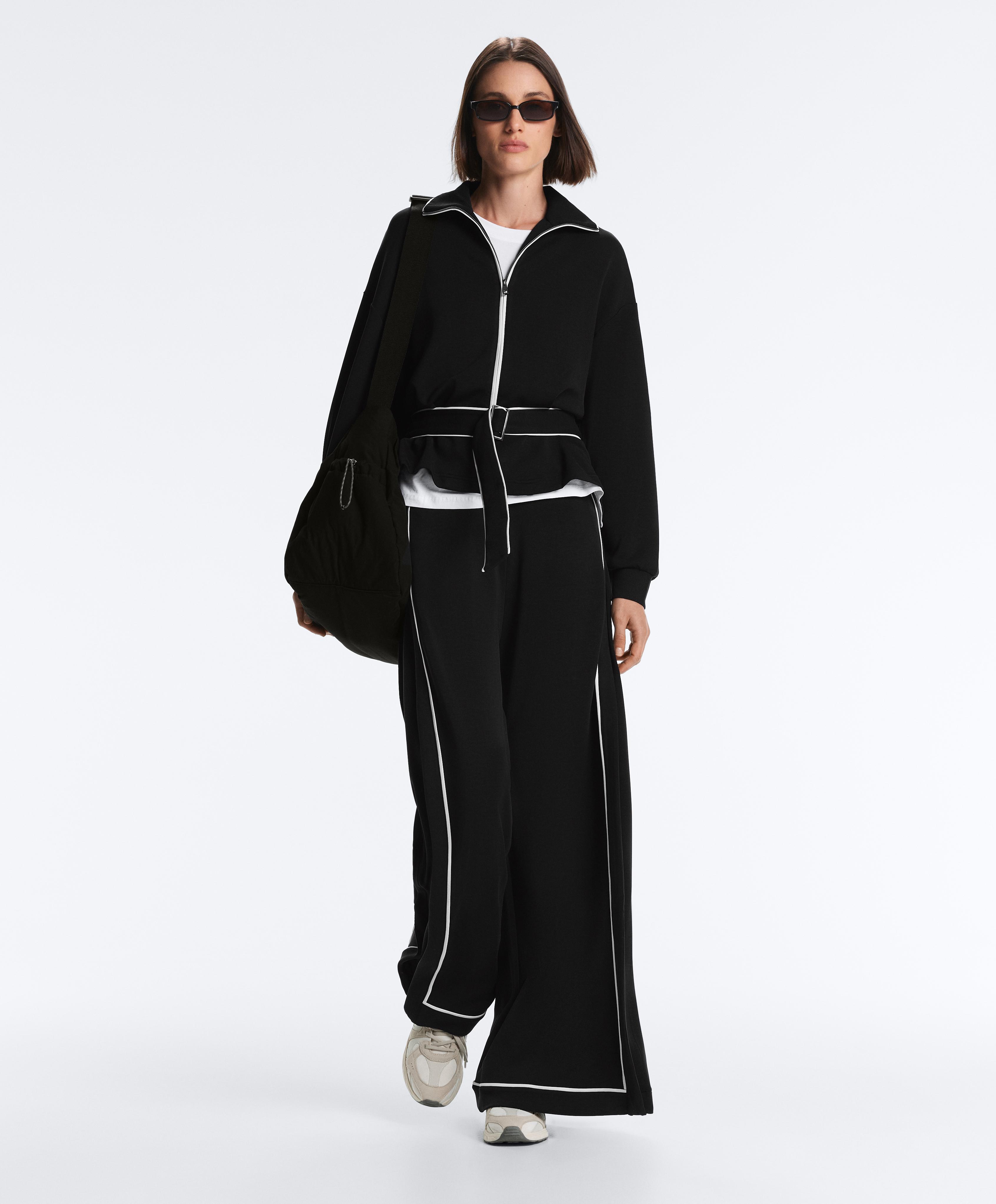 Soft-touch modal wide-leg trousers with contrast piping — BLACK
