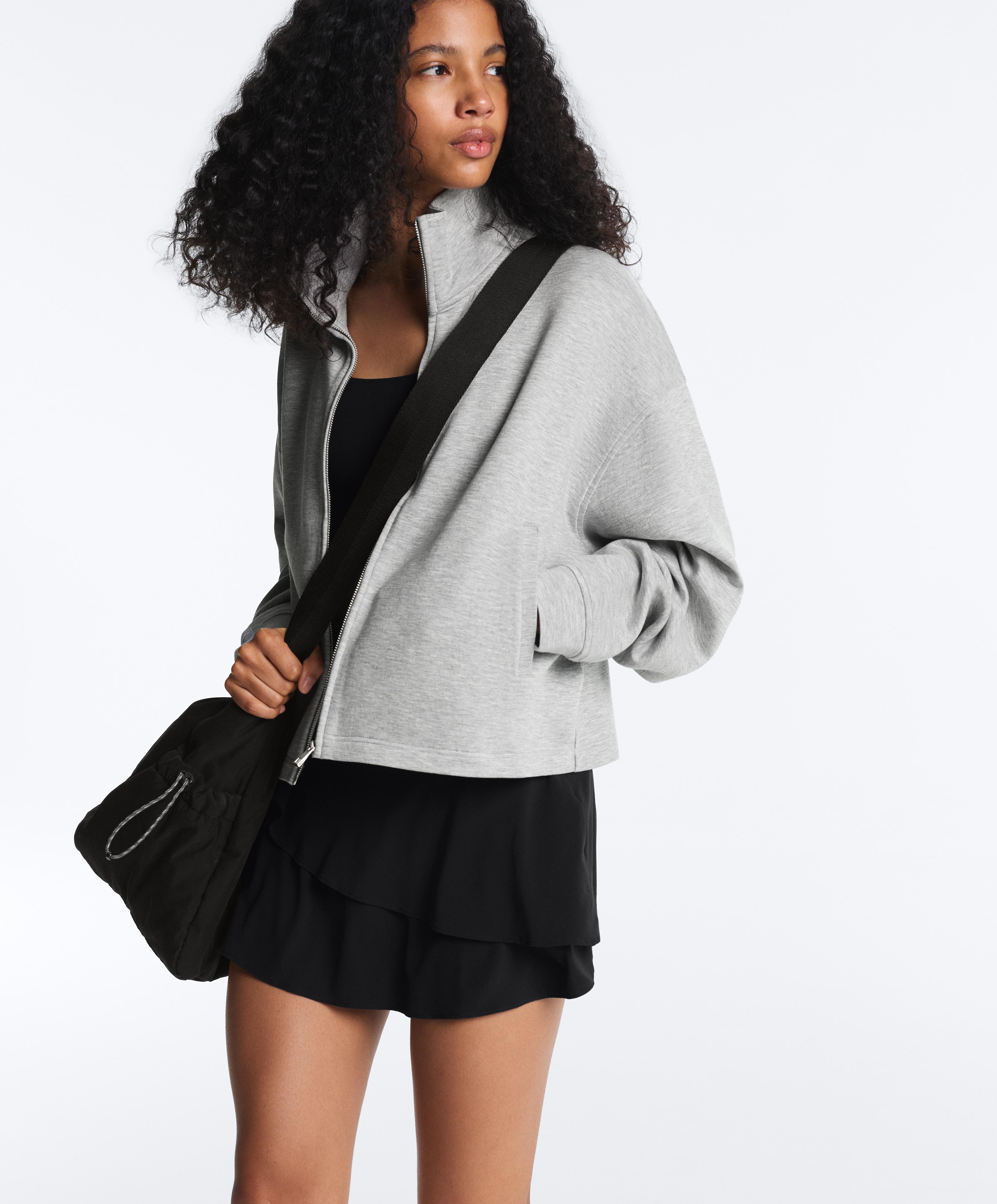 High-rise Compressive frill short skirt — BLACK