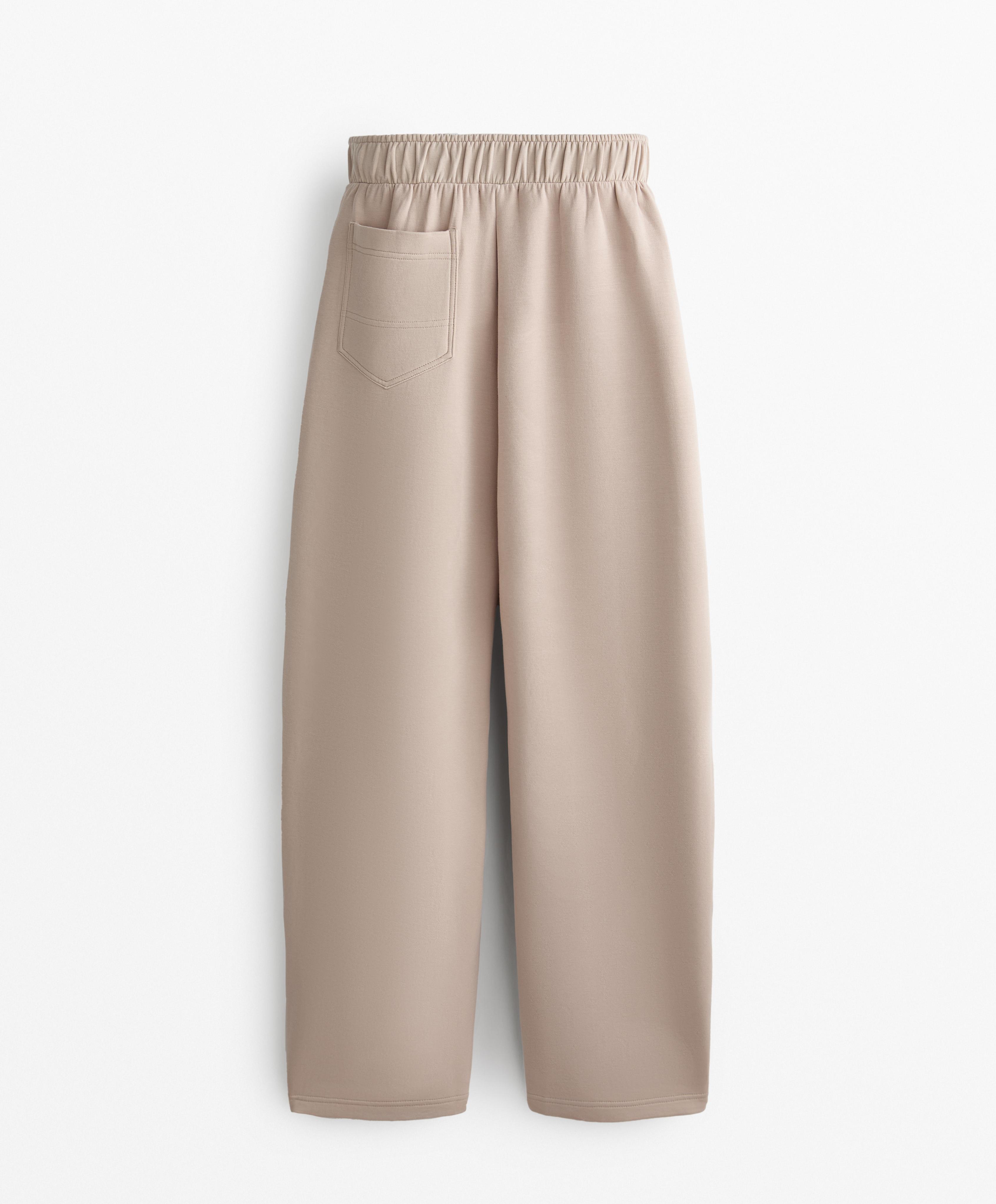 Relaxed cotton blend trousers with front details