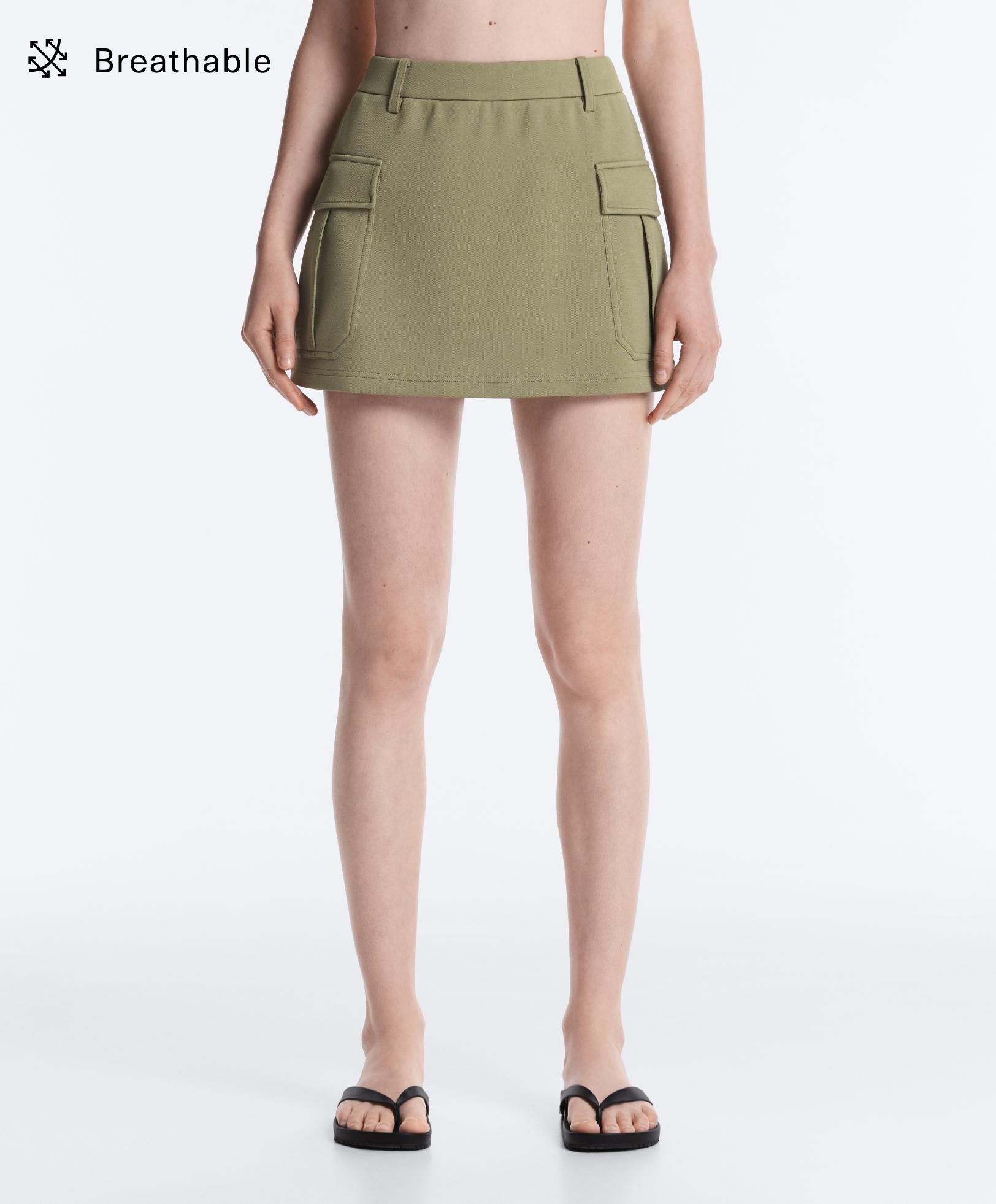 Short piqué skirt with cotton pockets - Sale