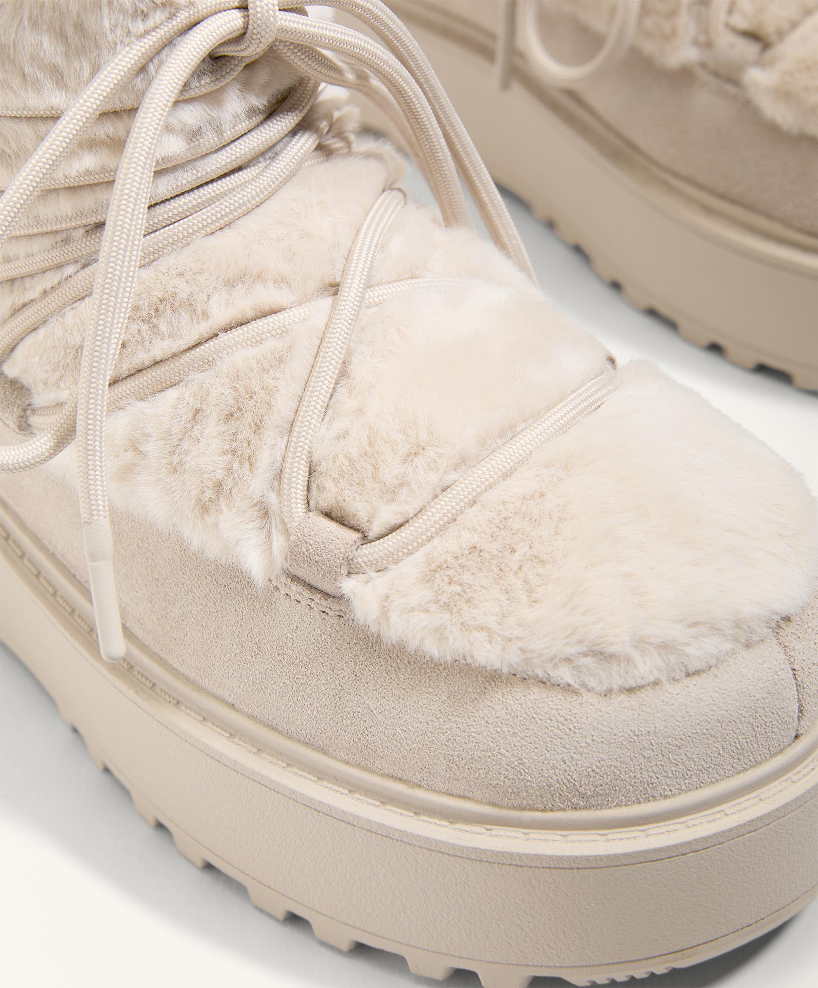 Faux-fur and split-leather lace-up boots