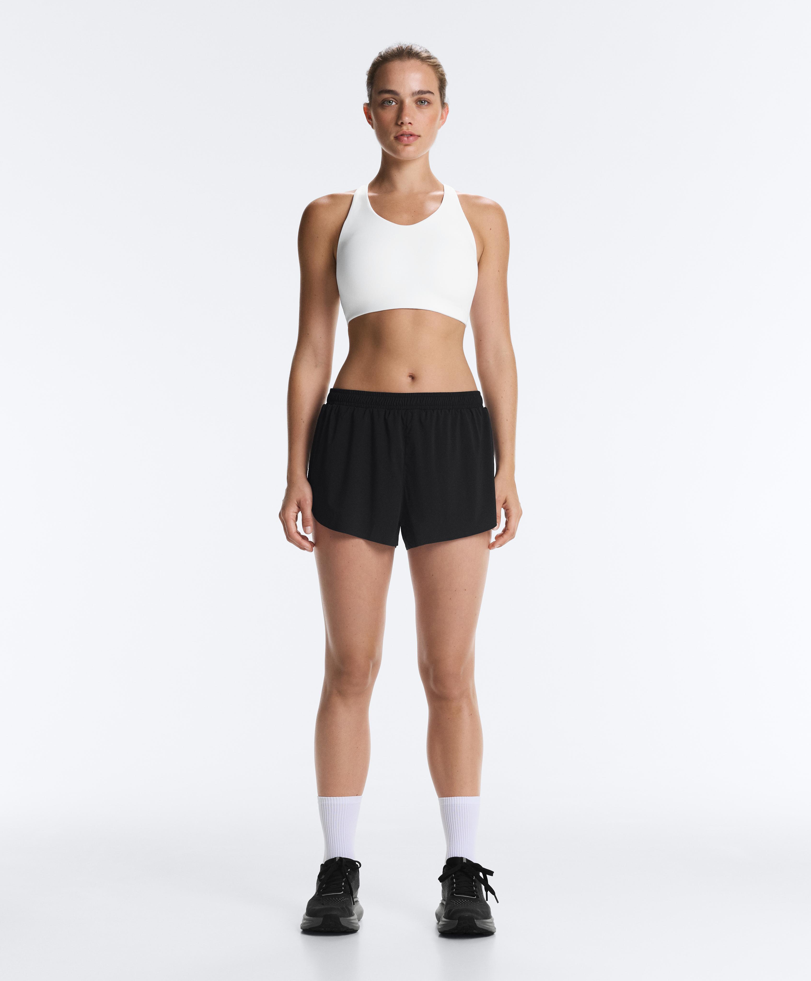 High-support Compressive sports bra with crossover back — WHITE