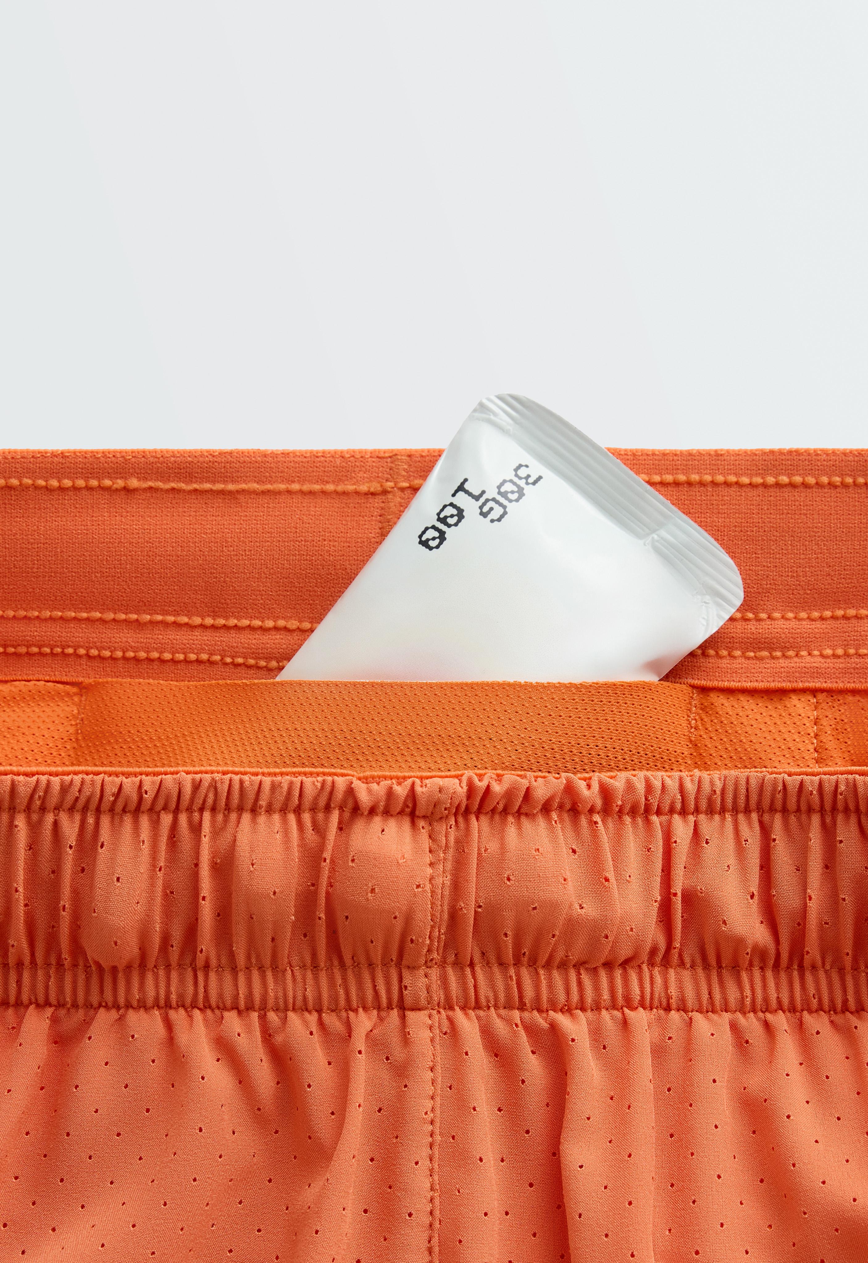 Mid-rise 7cm technical shorts — WASHED ORANGE