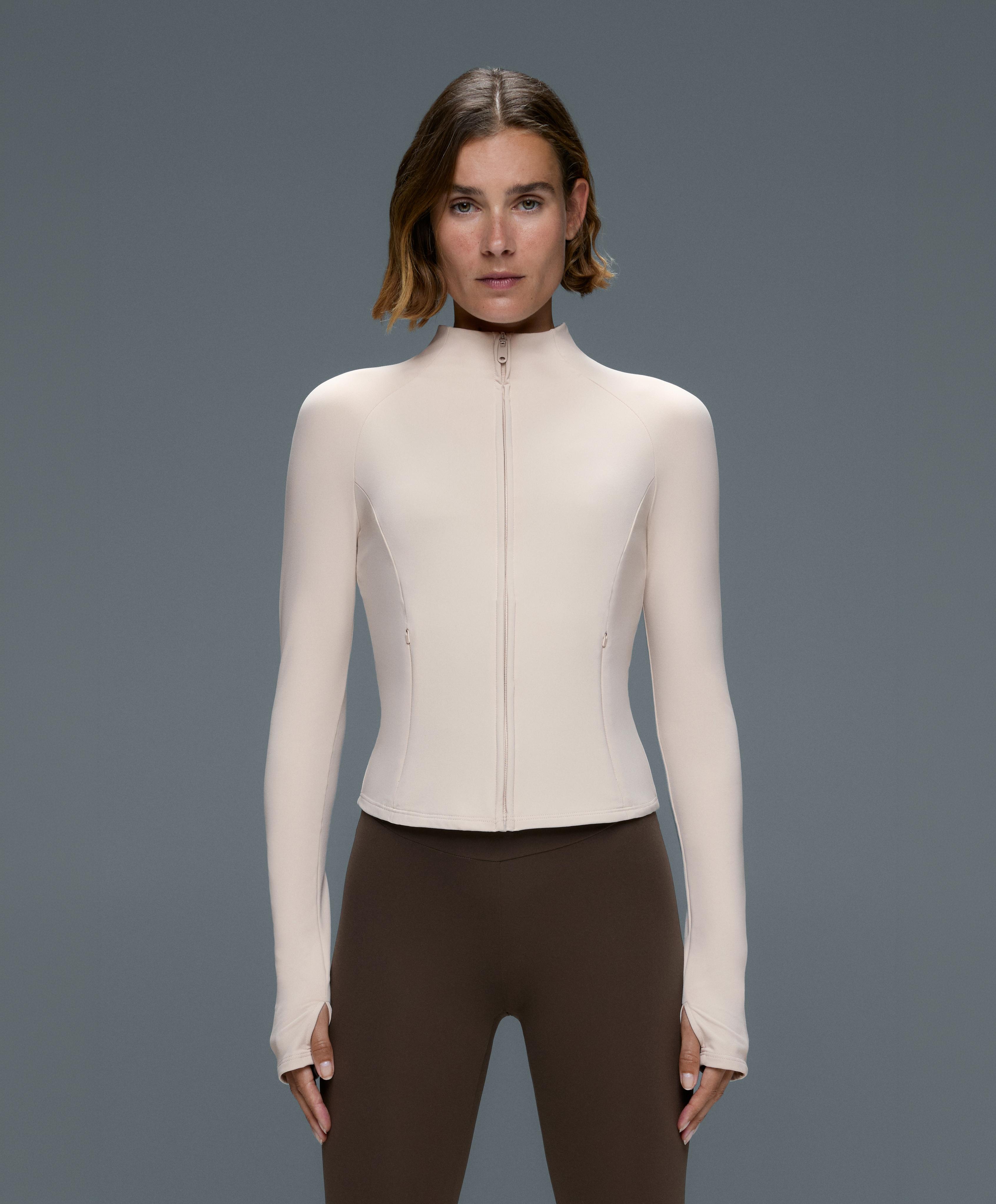 Short light warm technical jacket — PALE MINK