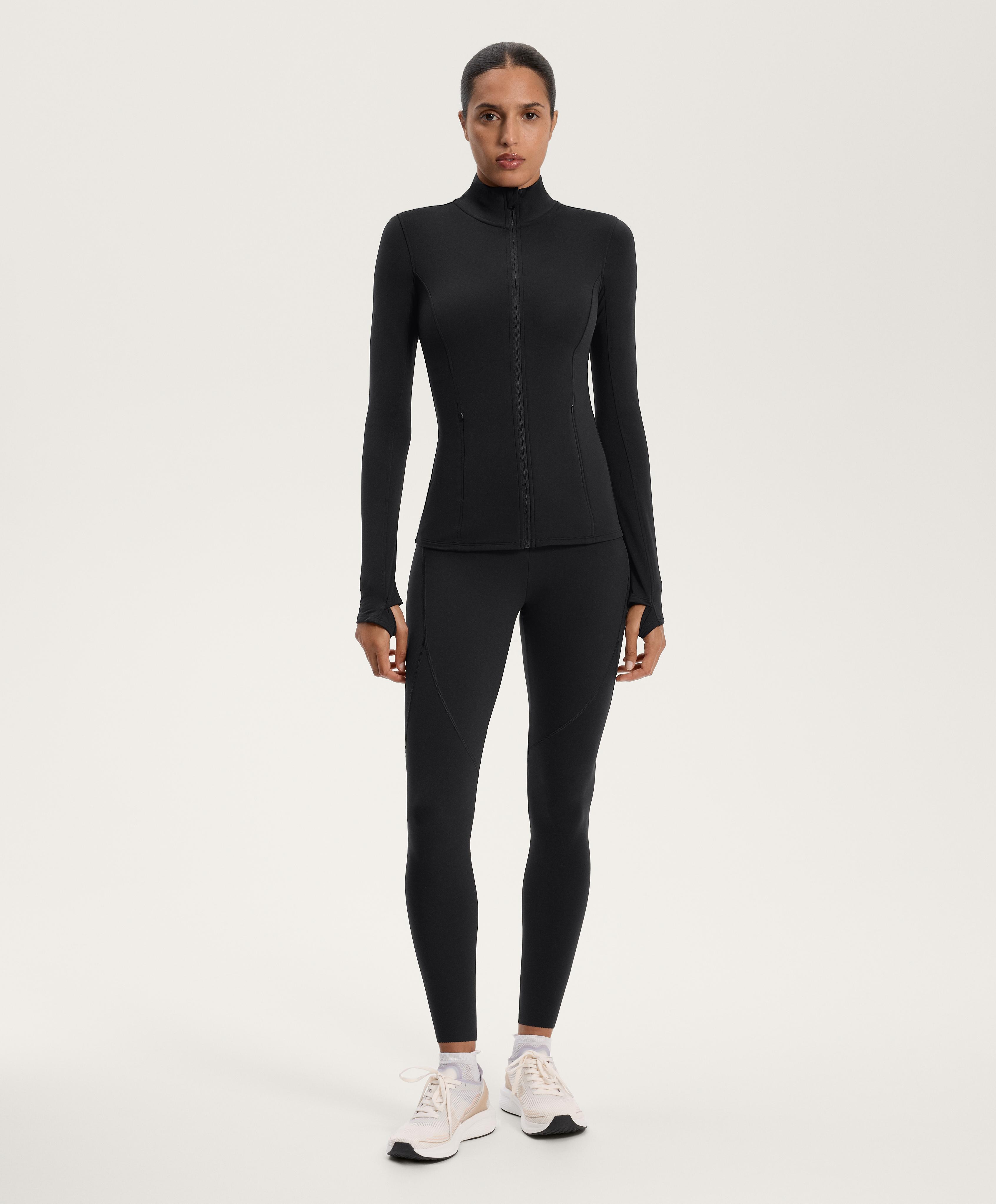 Total look running light warm negro con compressive basic