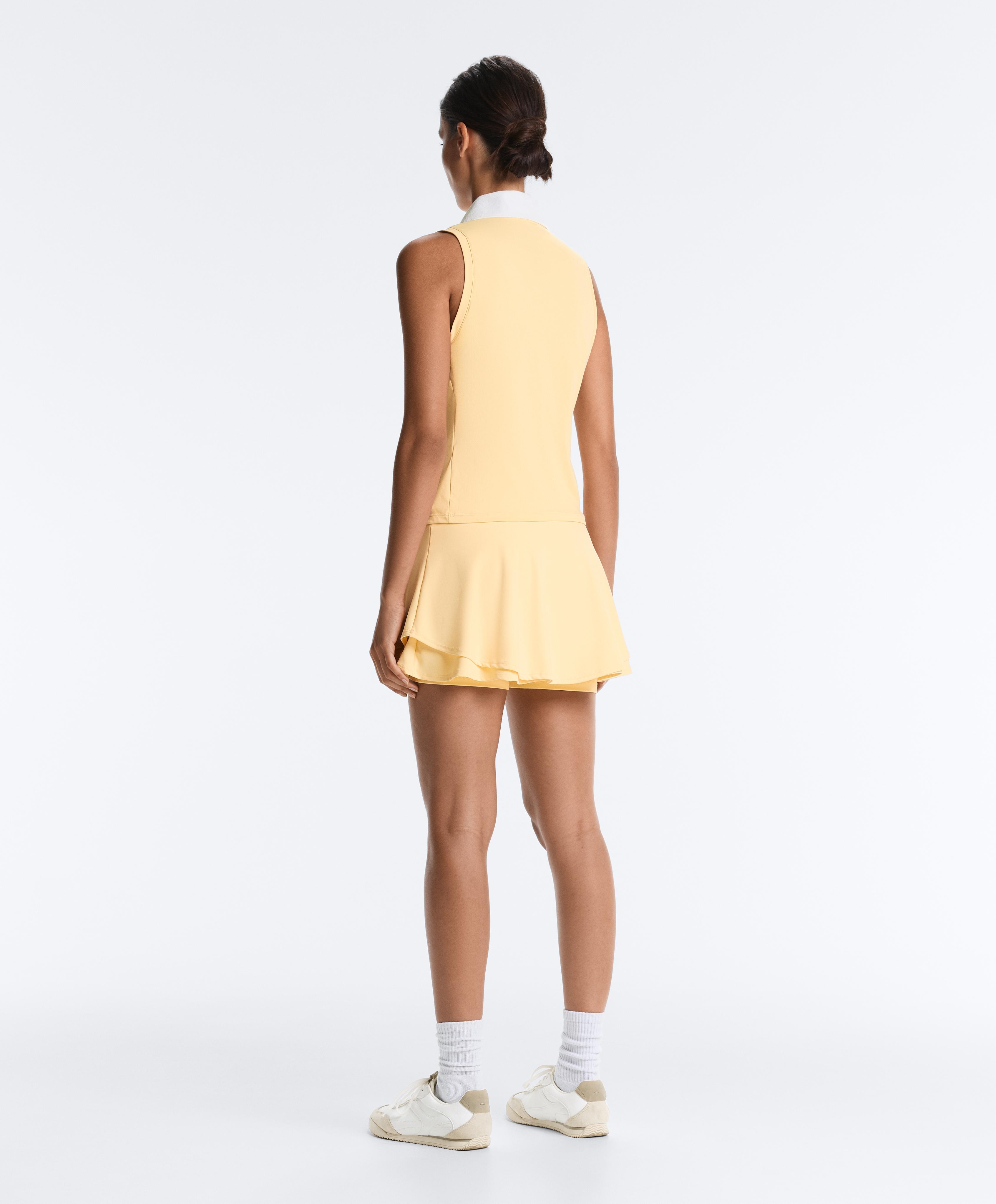 Double layer high rise short skirt — PALE YELLOW