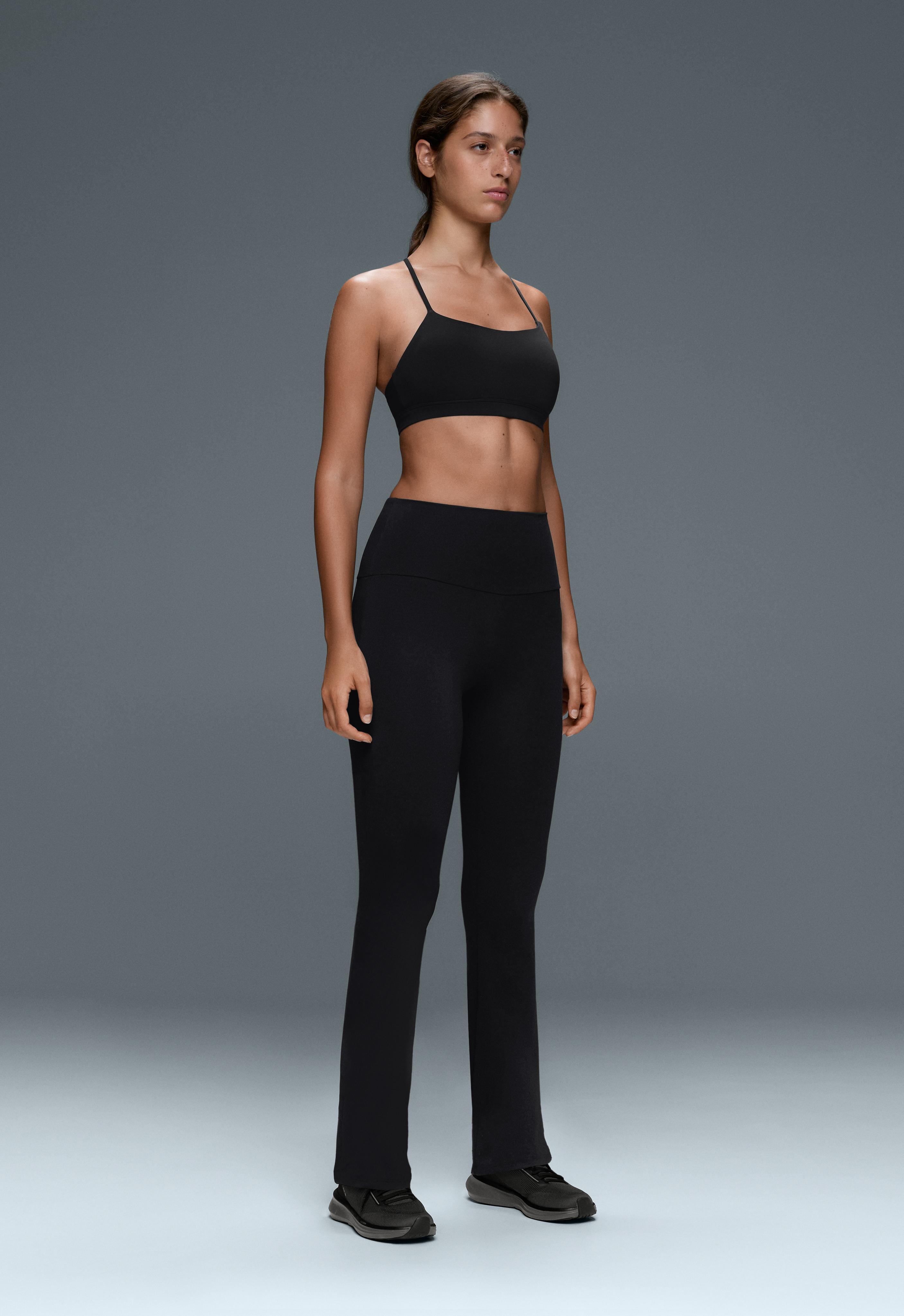 High-rise Comfortlux flare trousers — BLACK