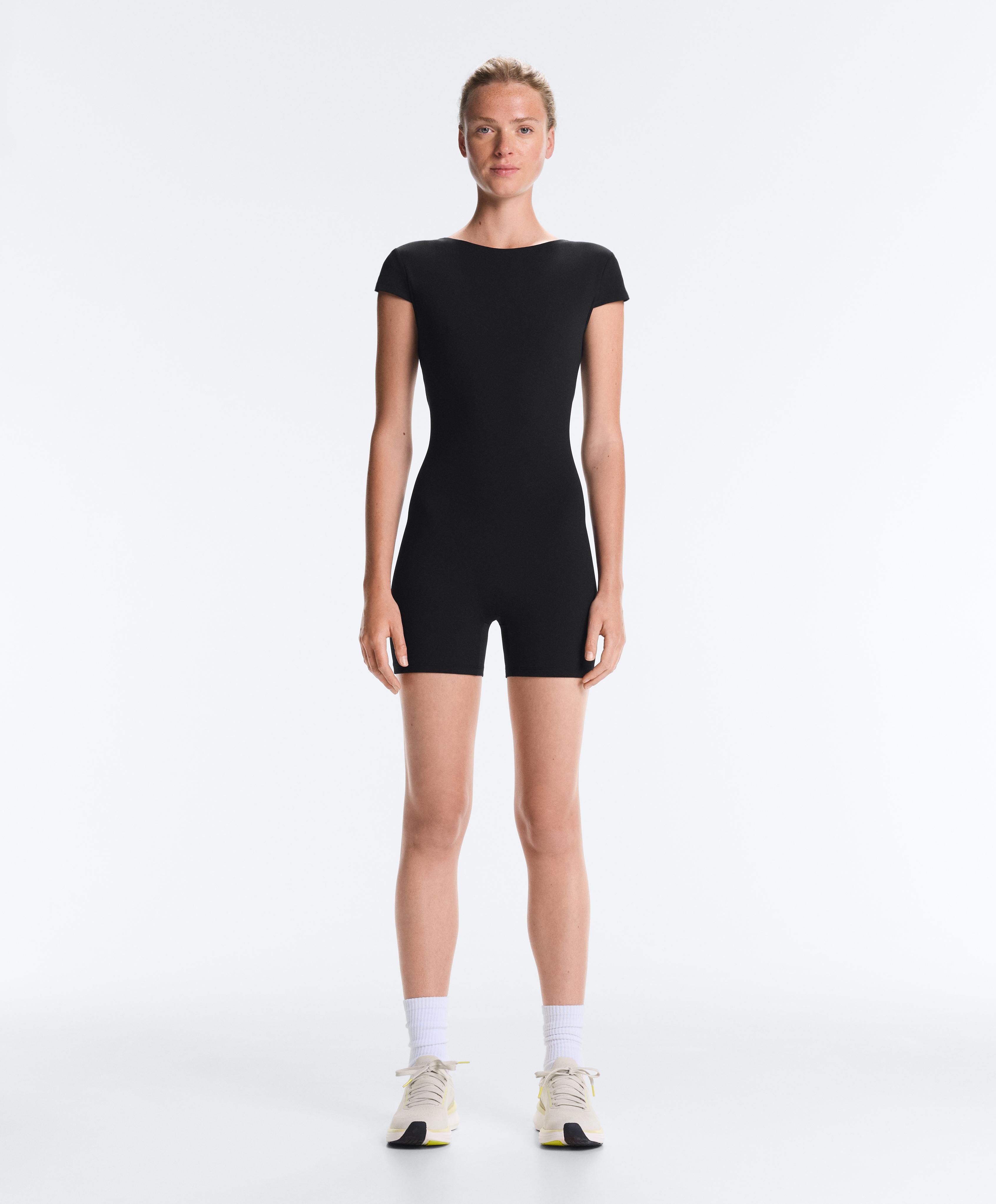 Comfortlux open-back short jumpsuit — BLACK