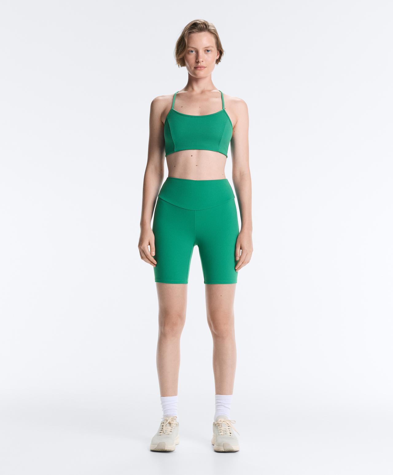 Low-support piqué sports bra — MID-GREEN MELANGE