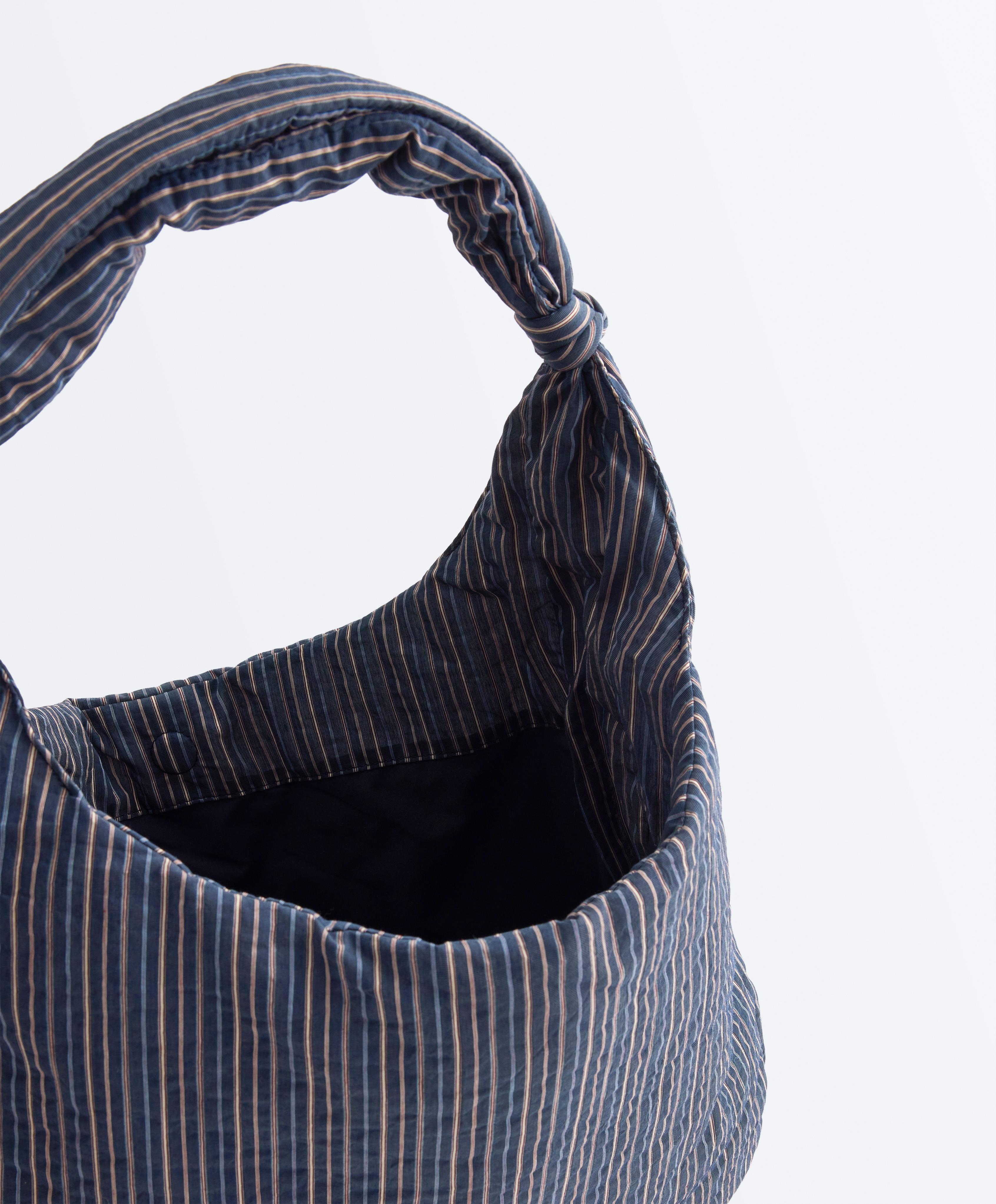 Bolsa estampado rayas con nudo