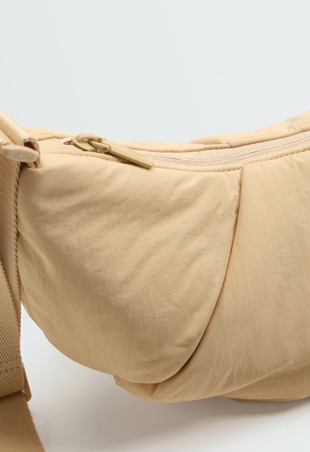 Quilted crossbody bag — CREAM