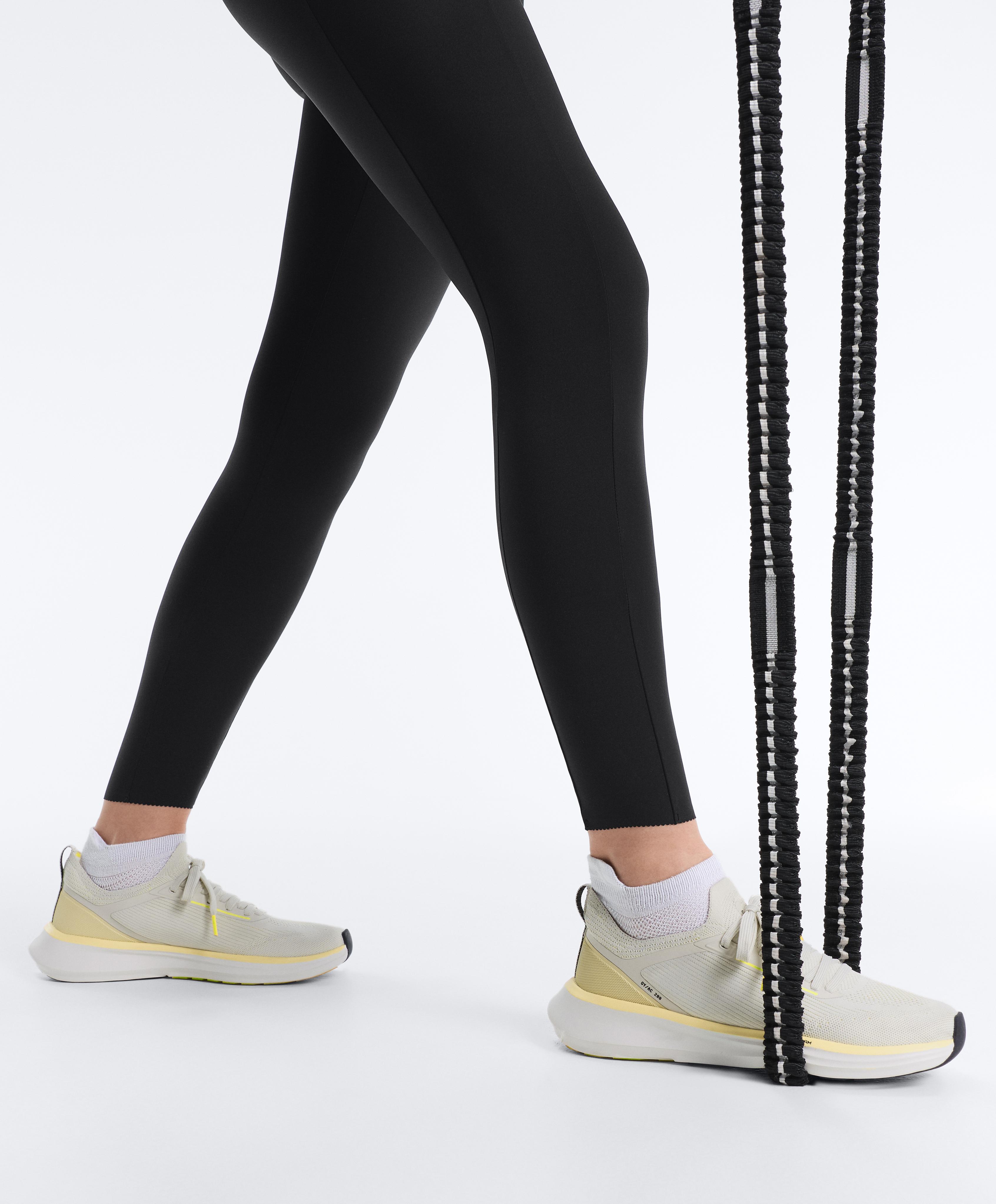 Compressive high-waisted pocket ankle-length leggings — BLACK