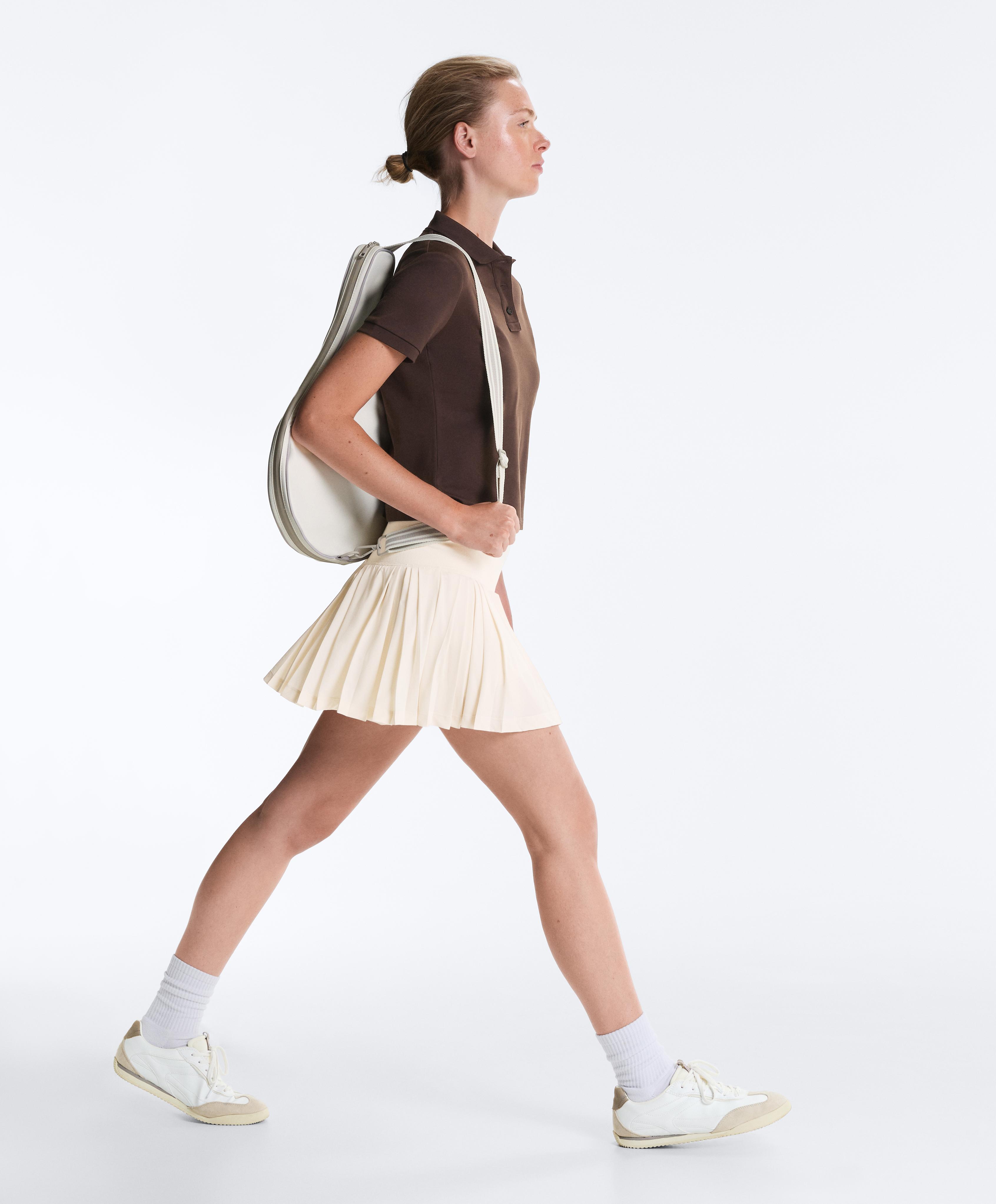 Pleated high-rise seamless short skirt — PALE ECRU