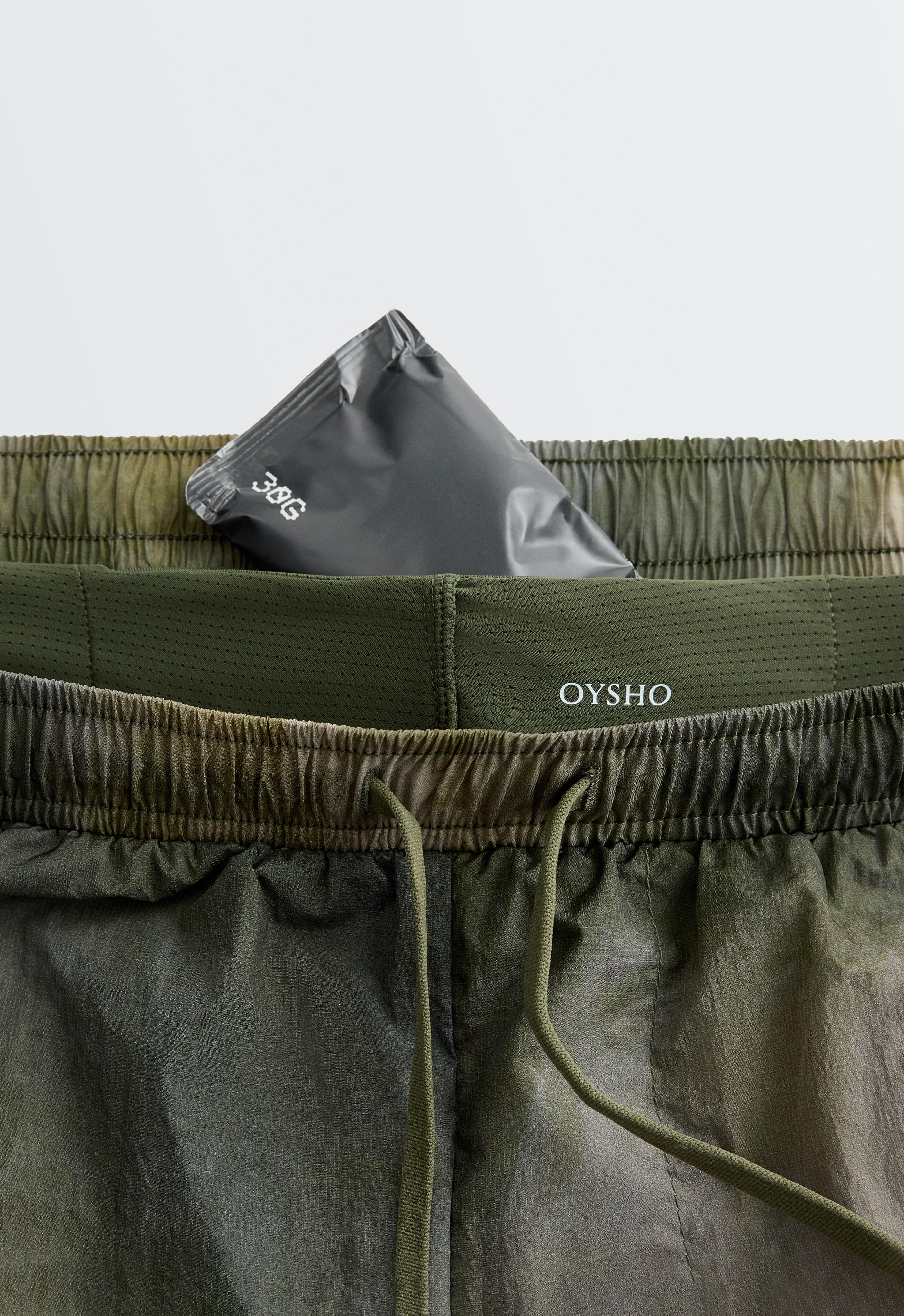 Printed mid rise 2-in-1 technical shorts — KHAKI