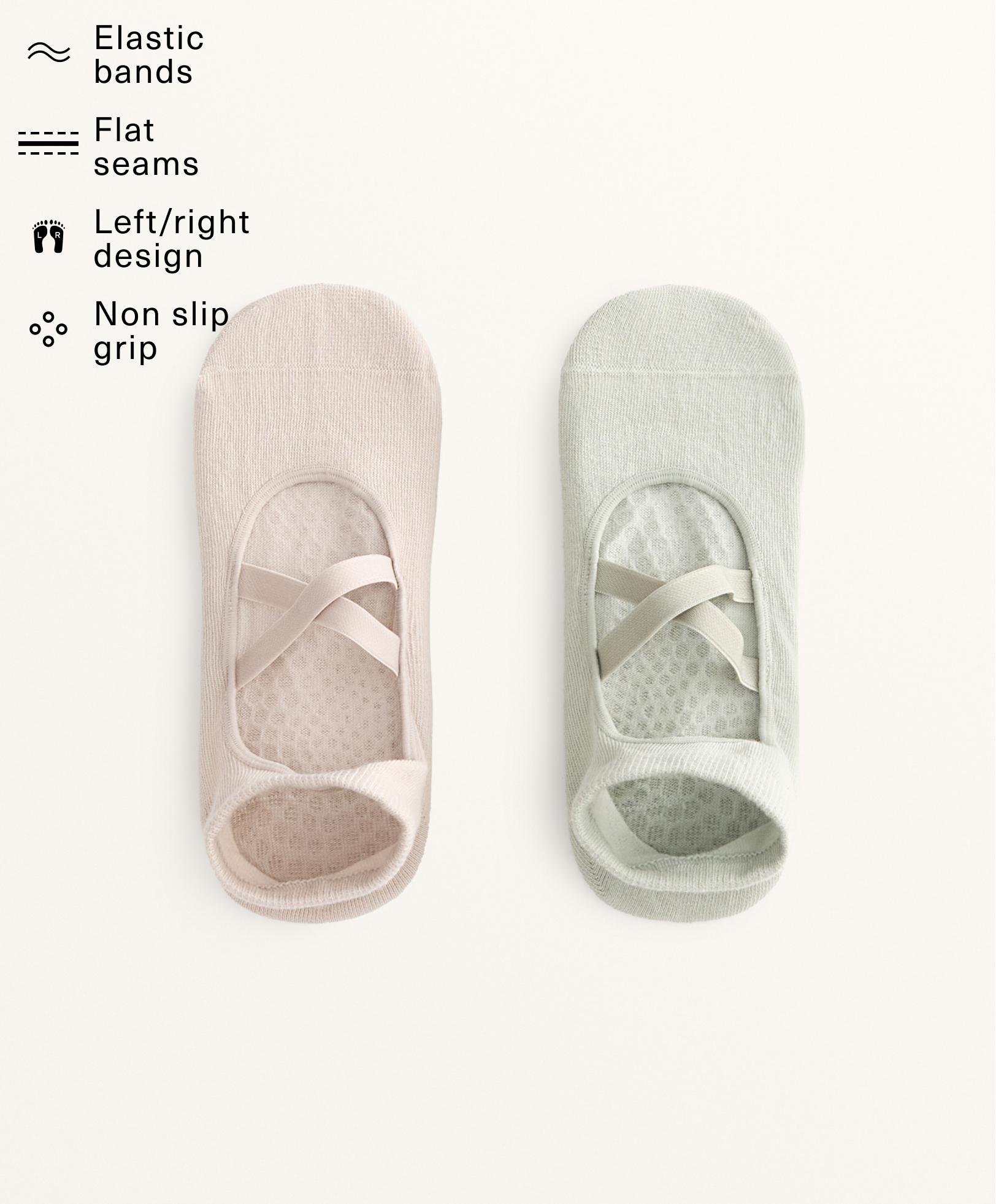 2 pairs of cotton blend yoga and Pilates socks with crossover straps