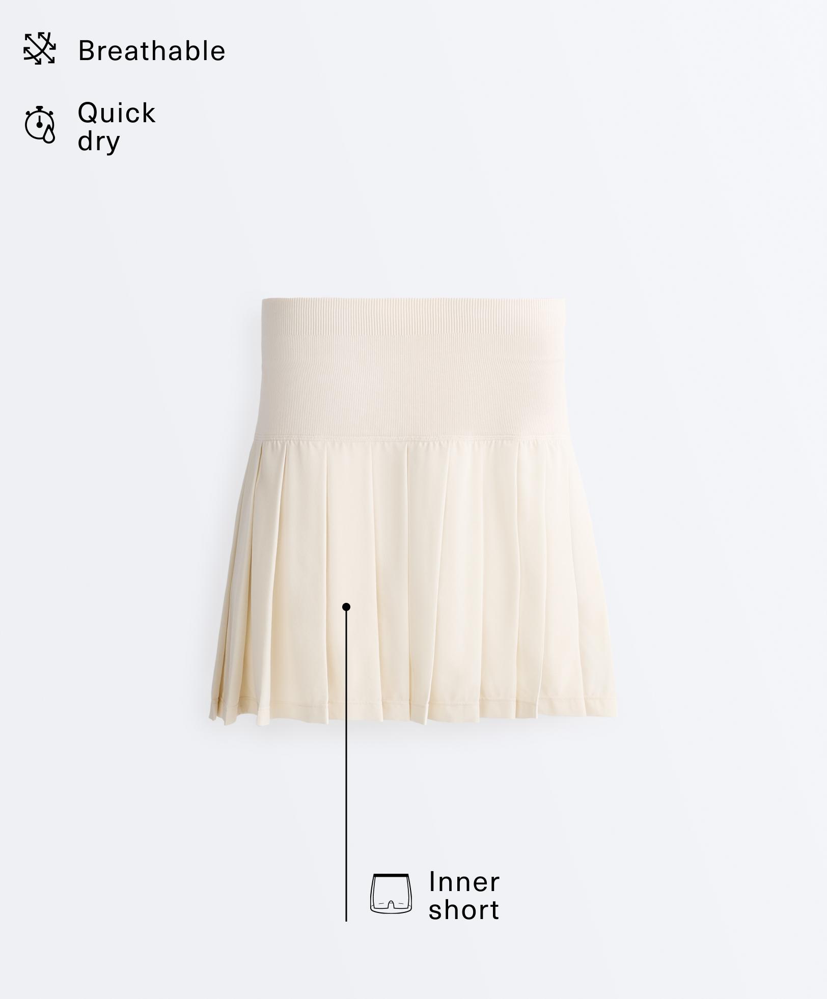 Pleated high-rise seamless short skirt