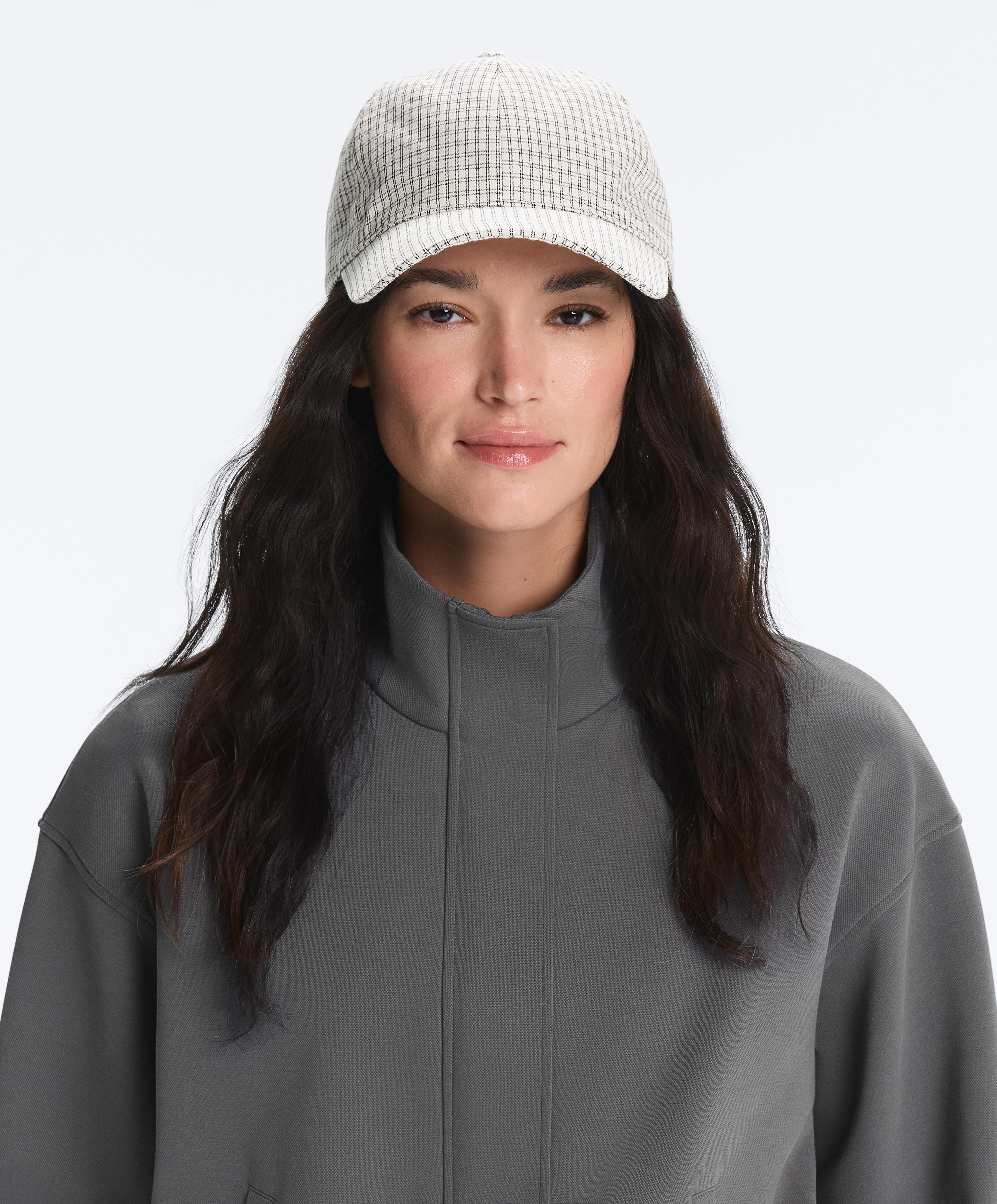 Check print cap — ECRU