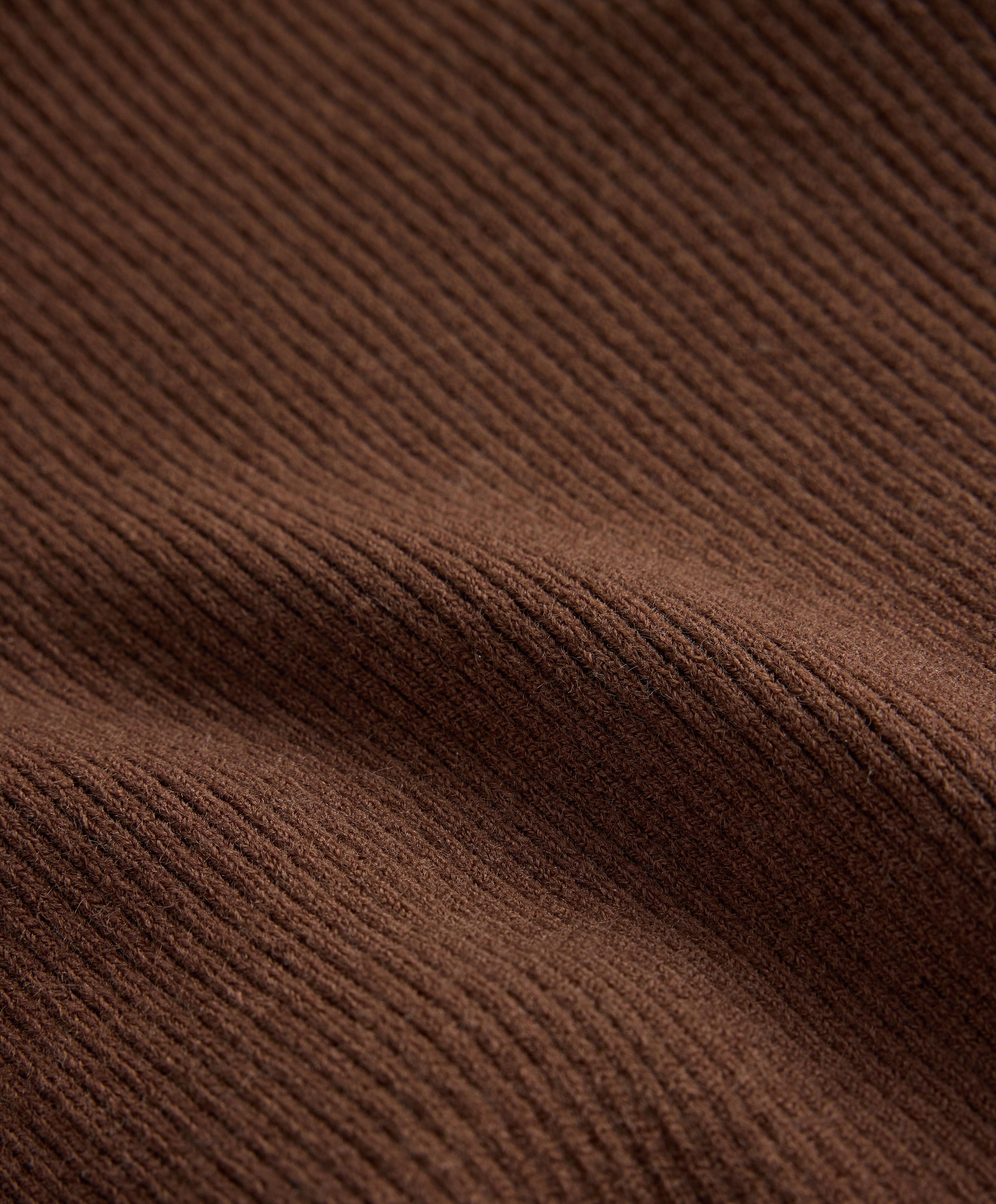 Gekreuzter Rippstrickpullover